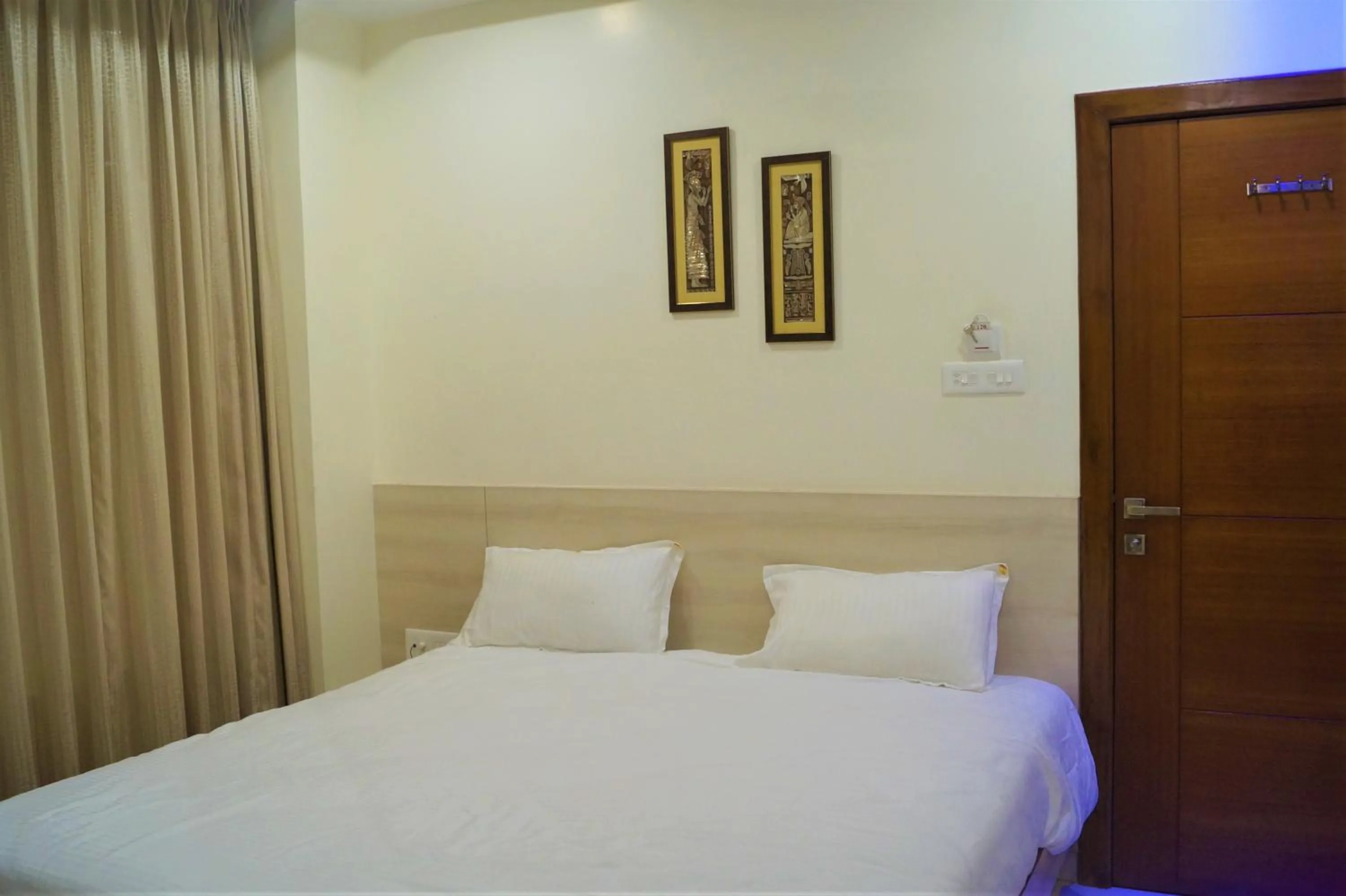 Bed in Hotel Shree Shyam International