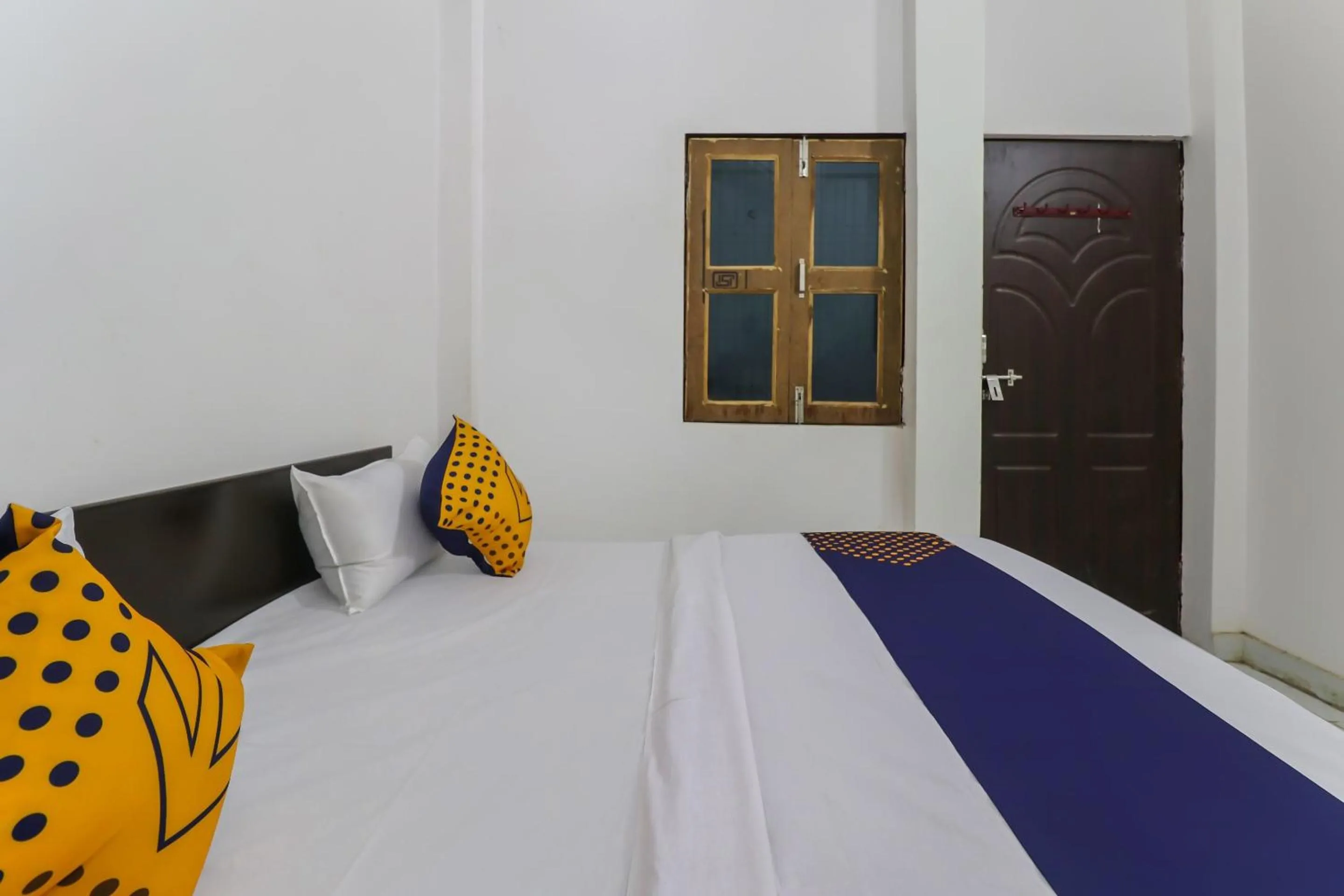 Bedroom, Bed in Hotel O Rajdhani Hotel