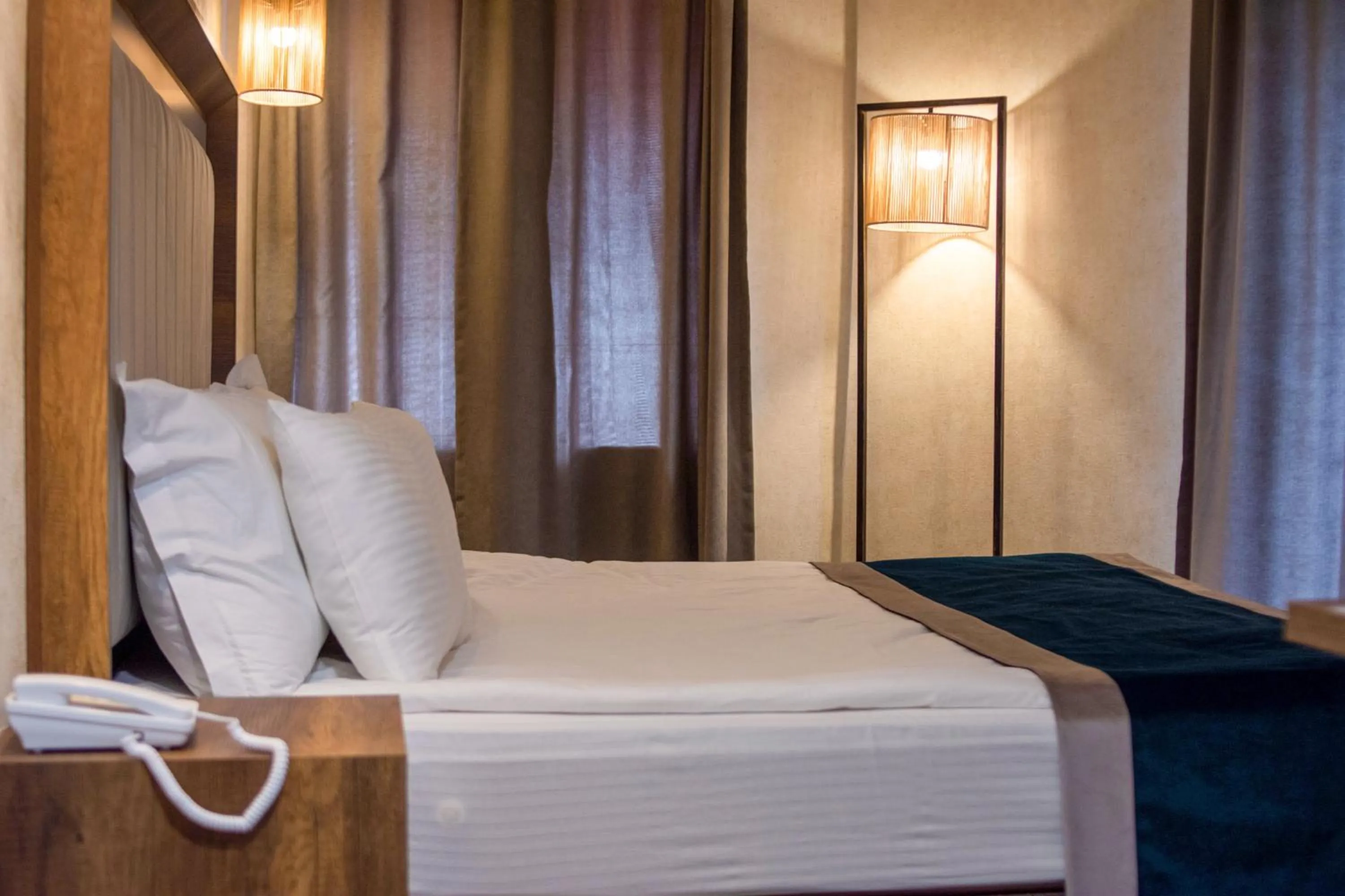 Bed in The Life Hotel & Spa