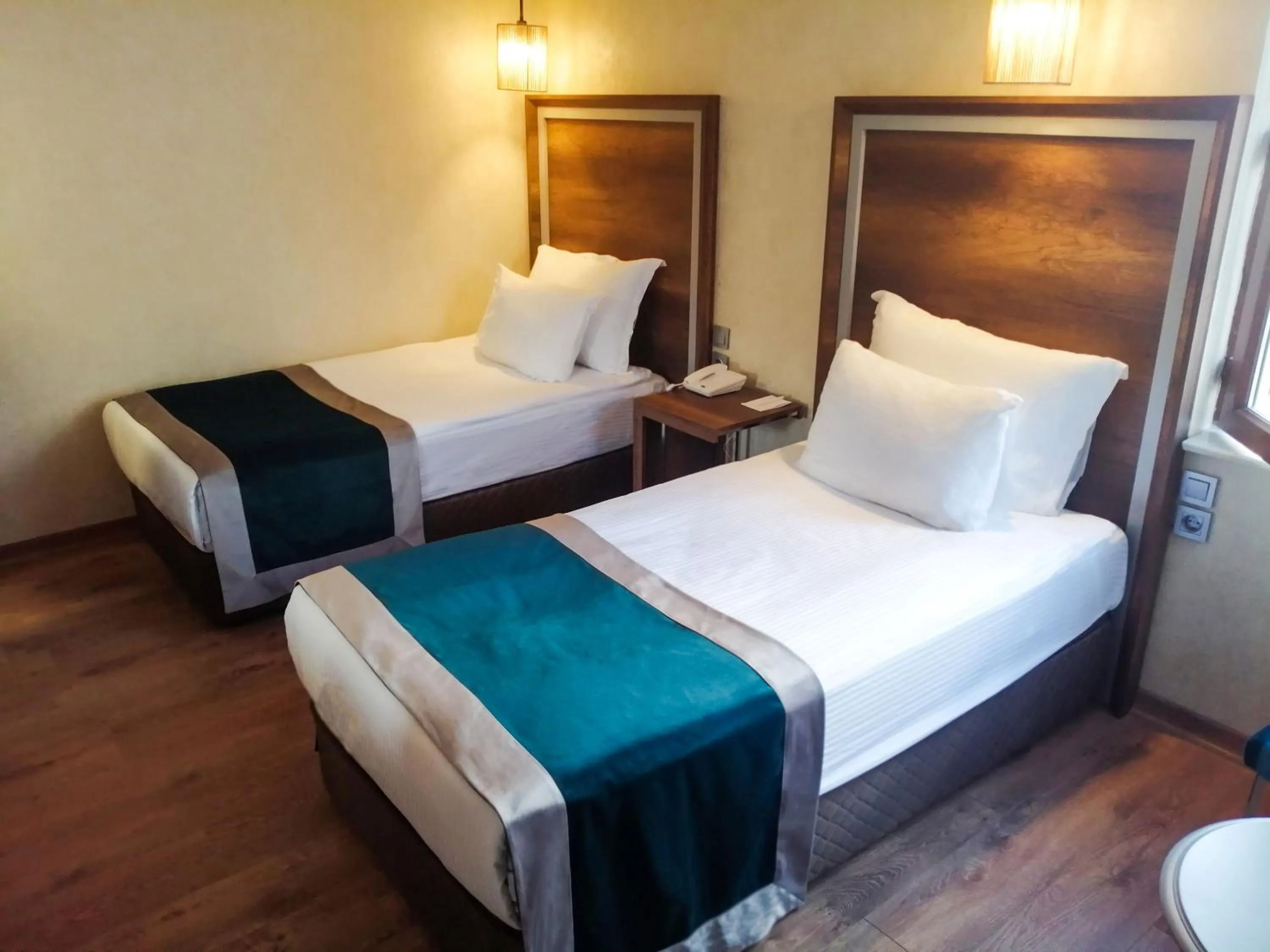 Bed in The Life Hotel & Spa