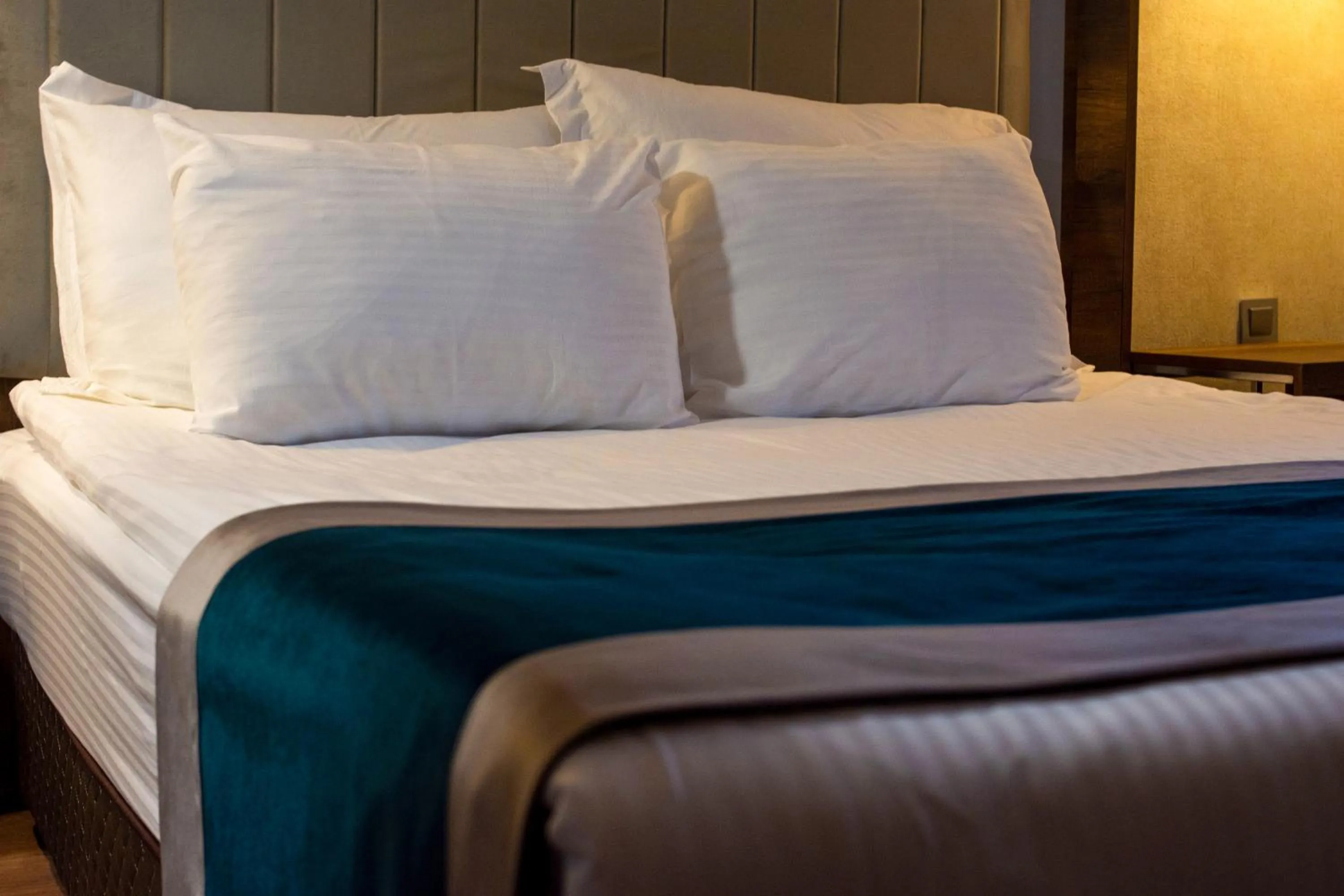 Bed in The Life Hotel & Spa