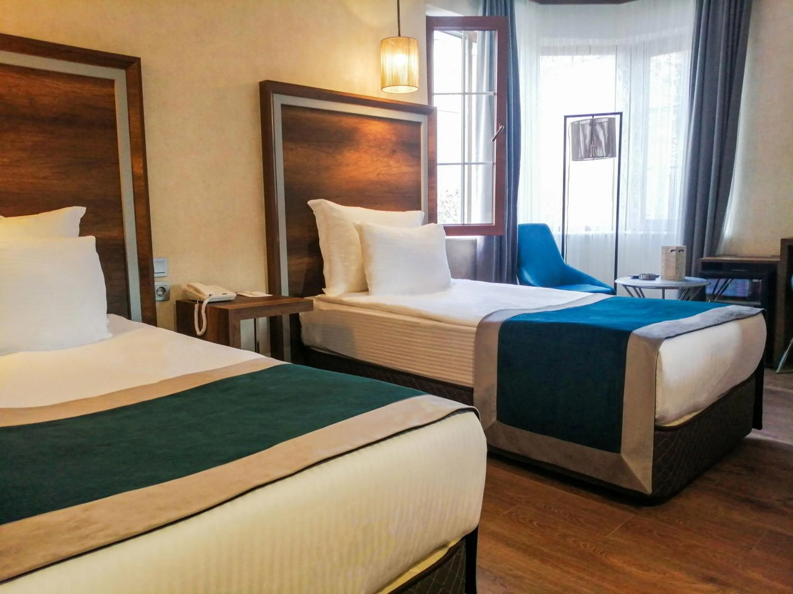 Bed in The Life Hotel & Spa