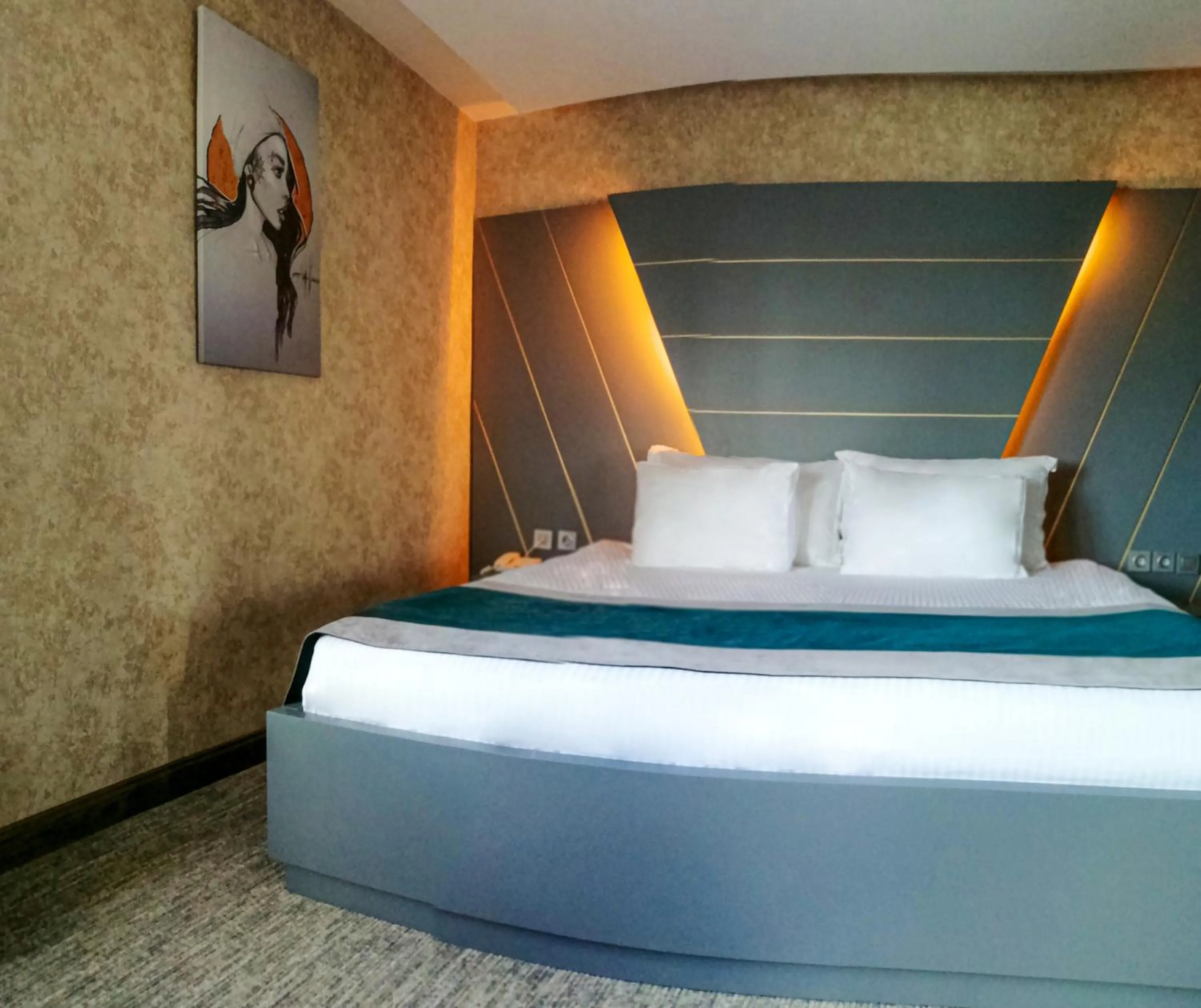 Bed in The Life Hotel & Spa