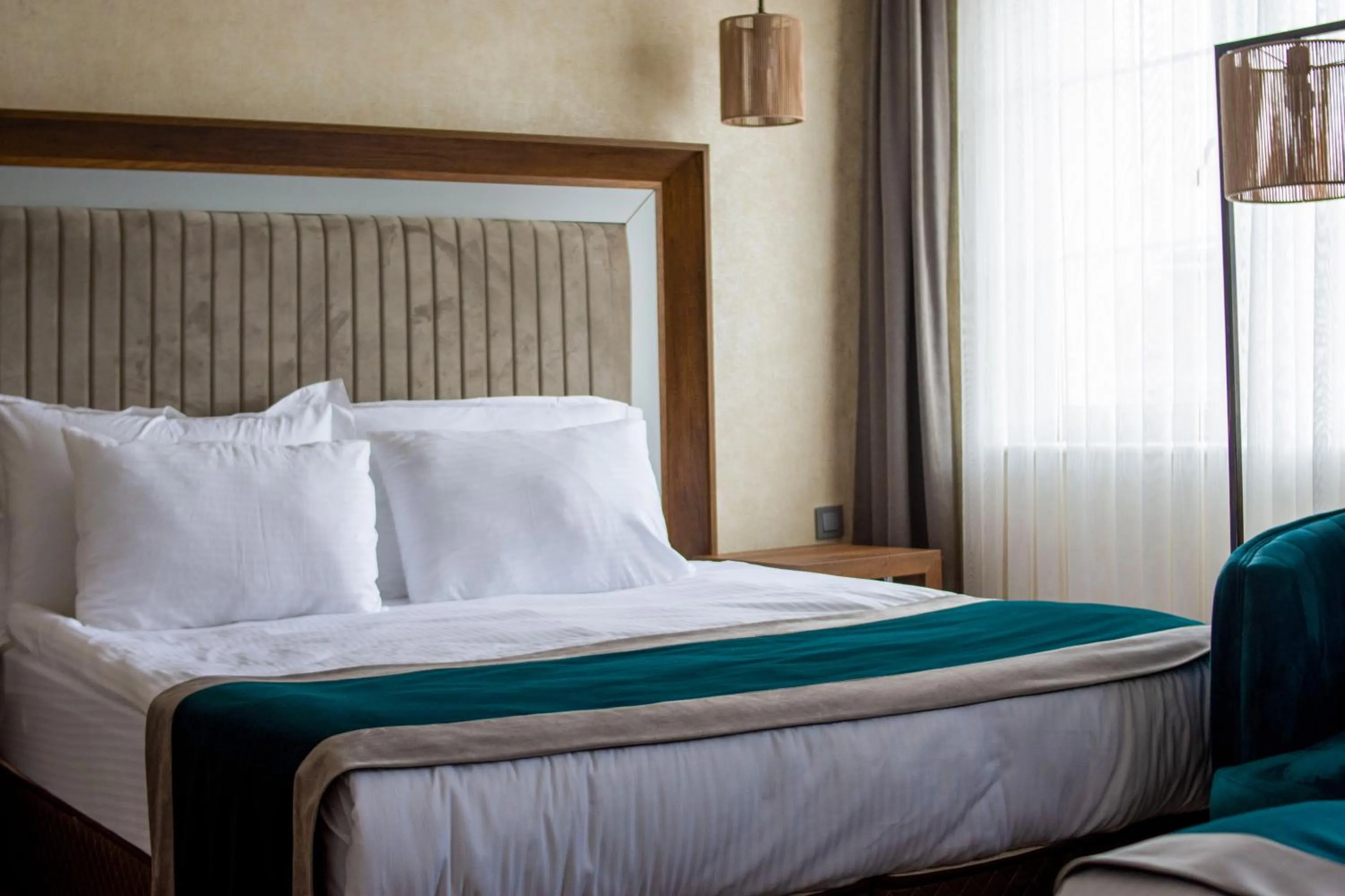 Bed in The Life Hotel & Spa