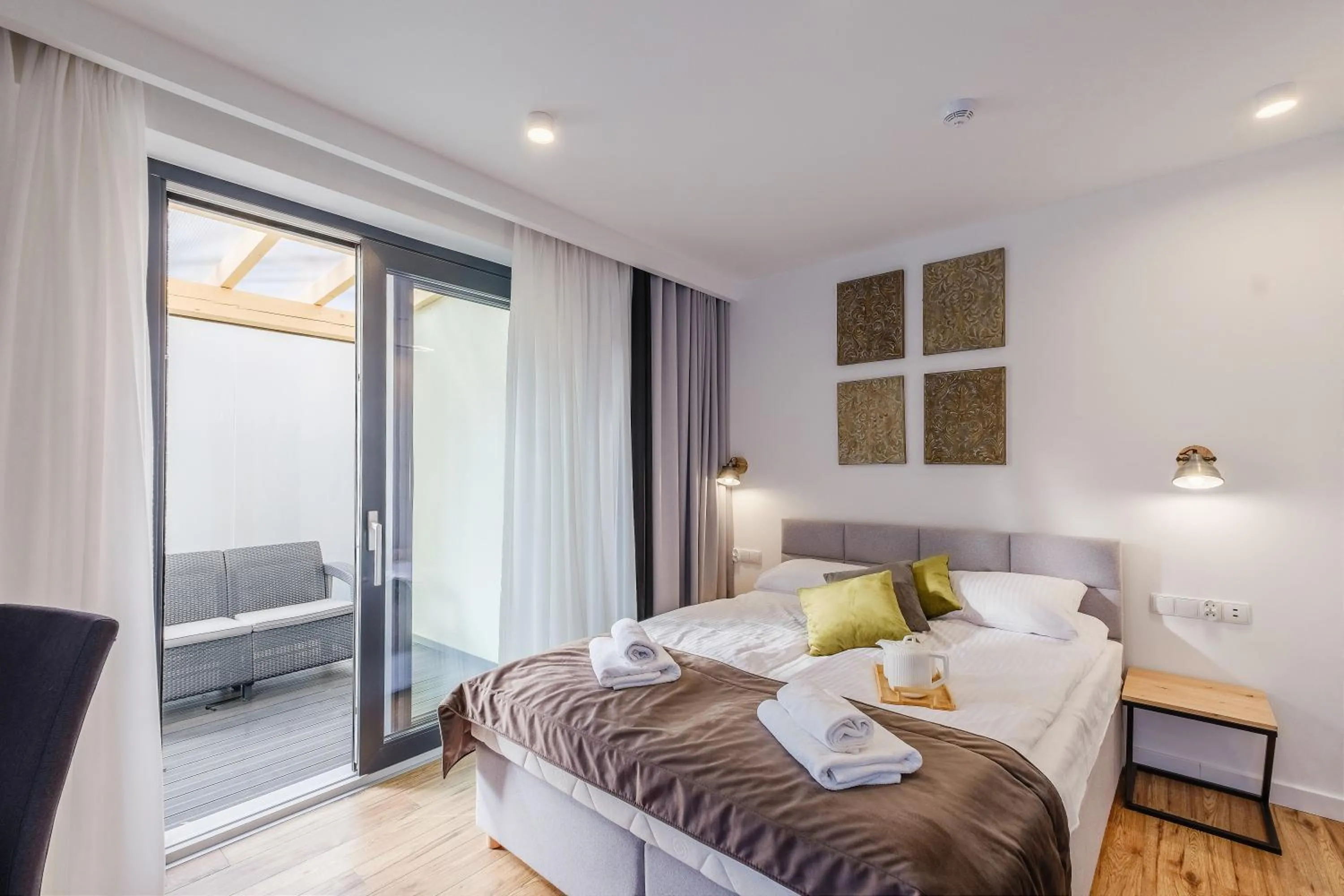 Bed in REZYDENCJA ORNAK 5 - stylowe apartamenty z balkonami i jacuzzi, 5 min pieszo do Krupówek, IZBY PODHALAŃSKIE