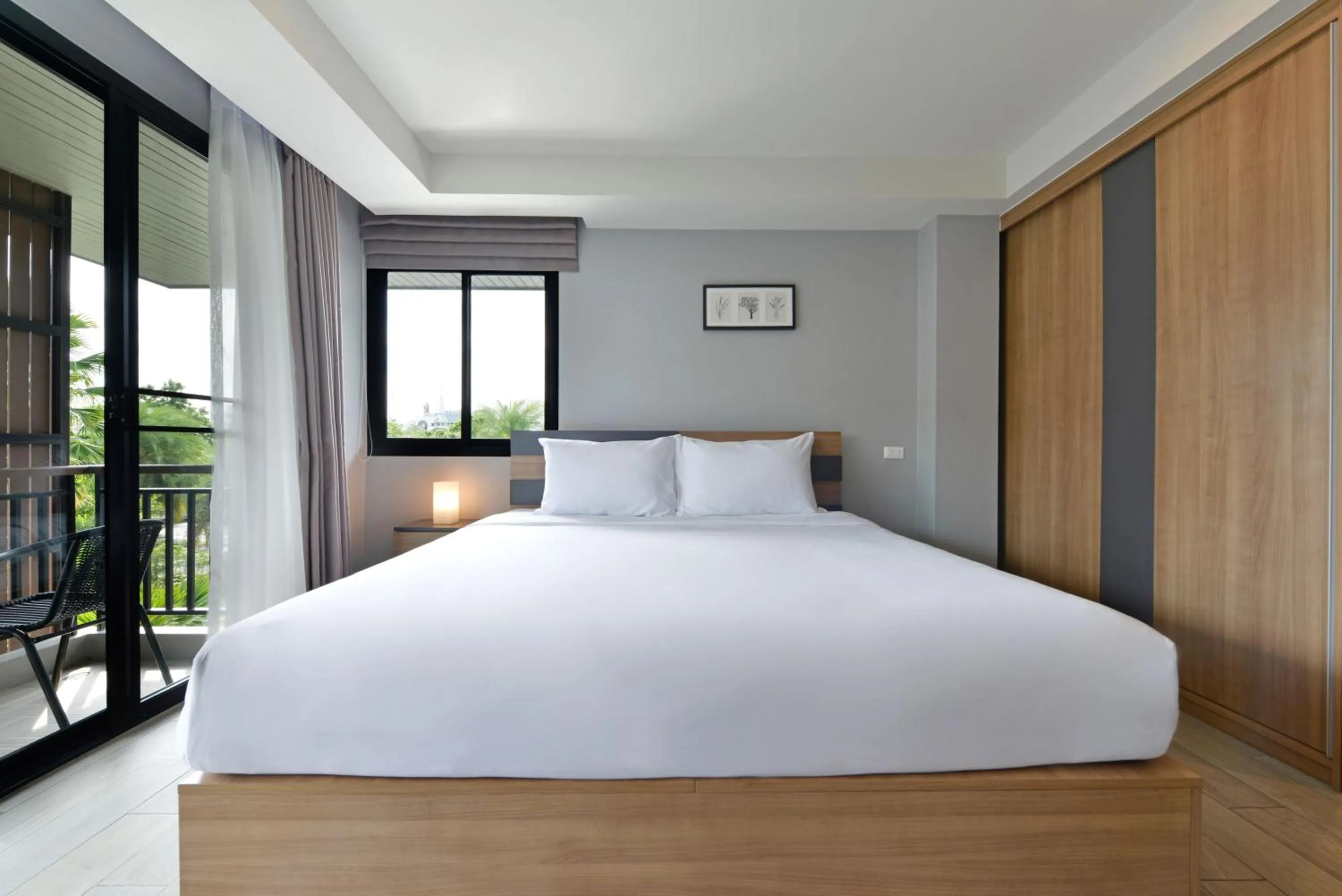 Bed in Raweewan Residence hotel