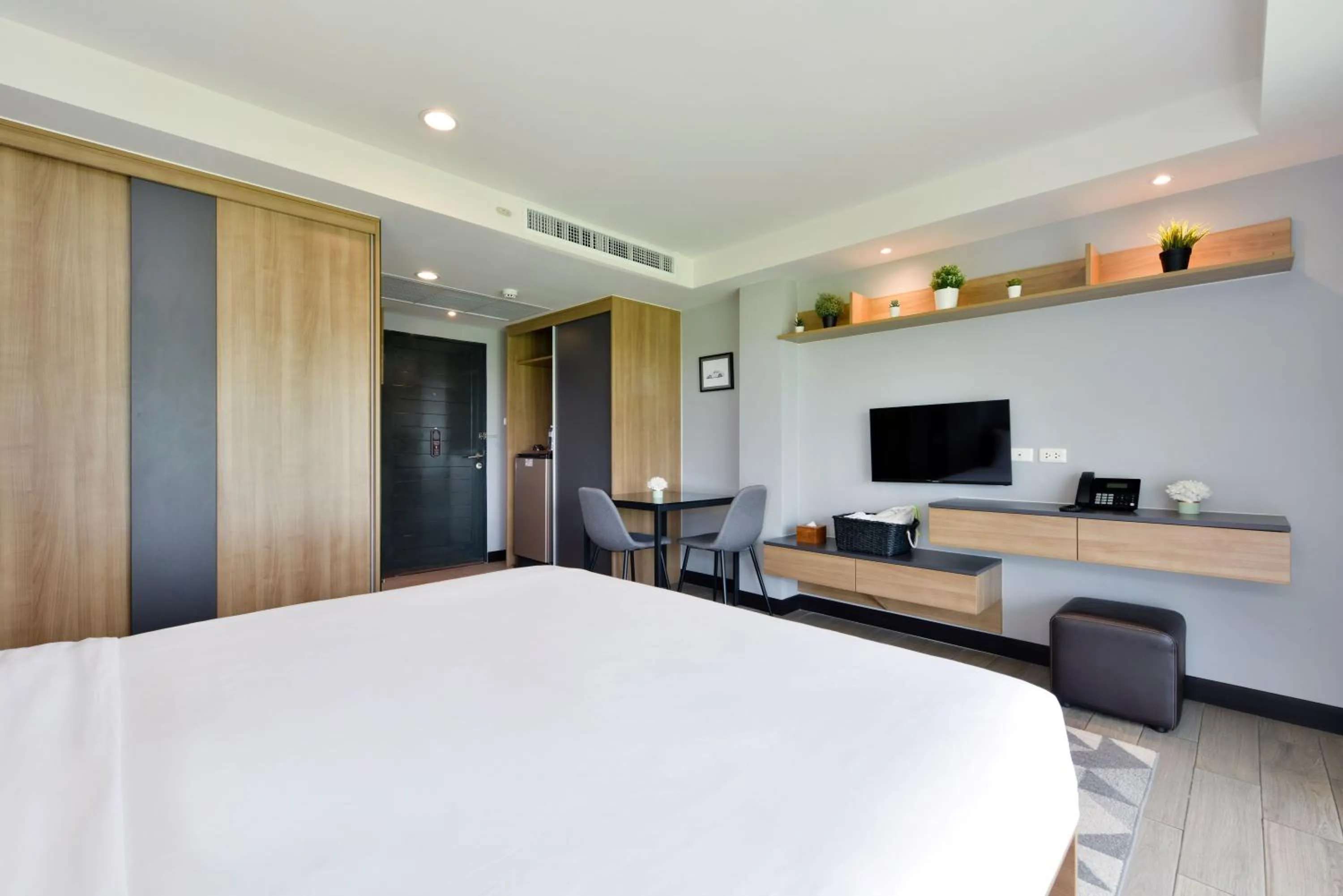 Bed in Raweewan Residence hotel