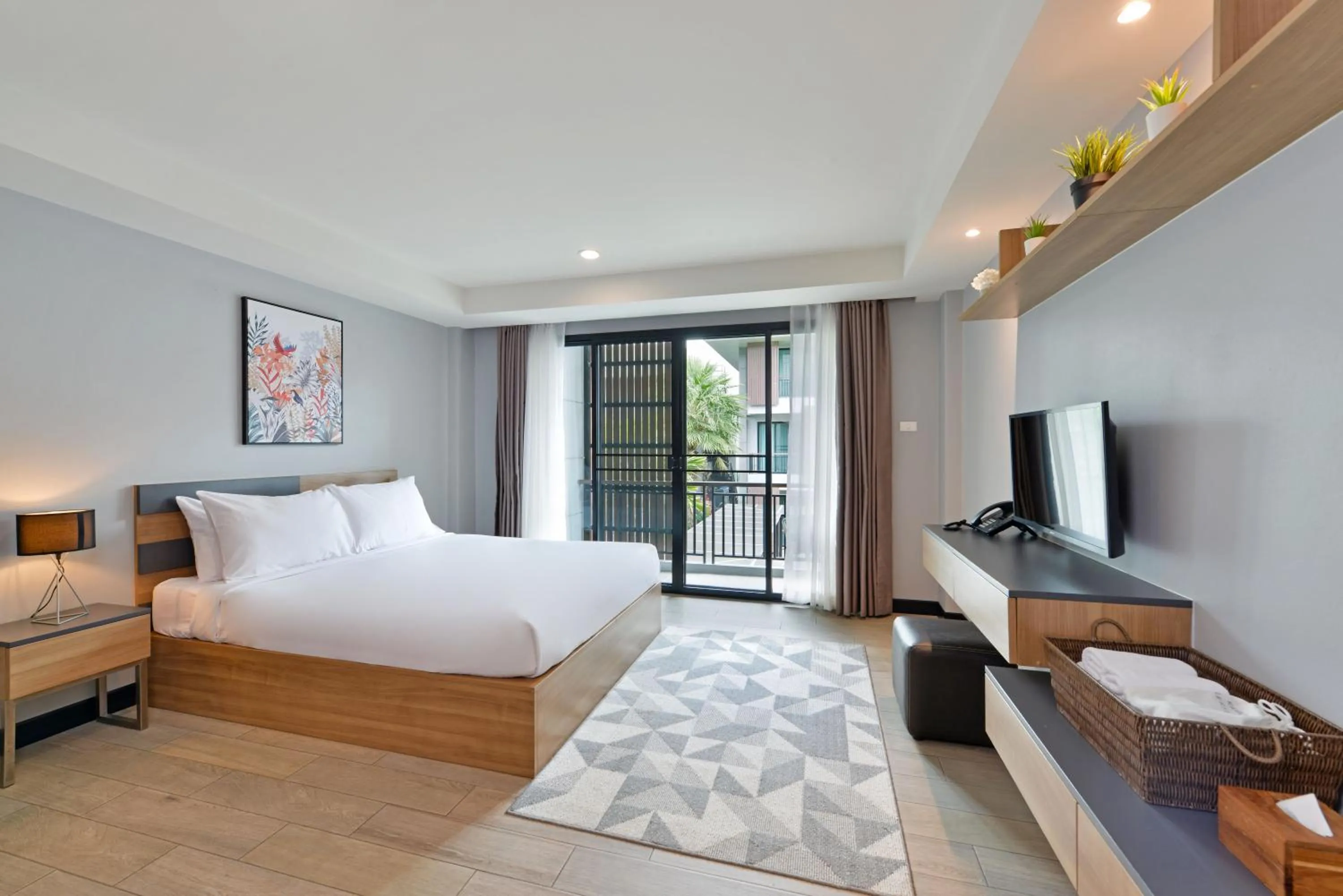 Bed in Raweewan Residence hotel