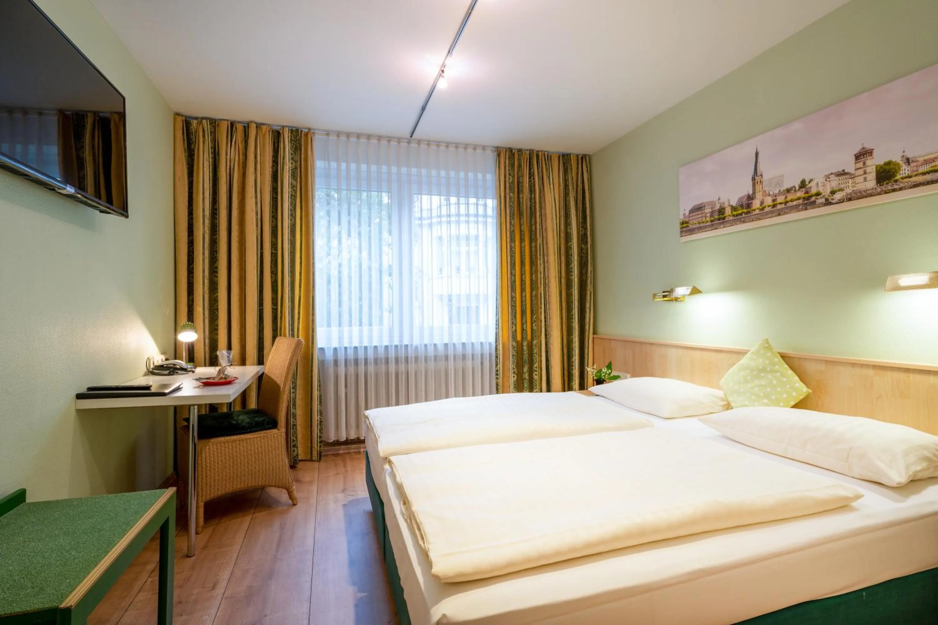 Photo of the whole room, Bed in Hotel Arosa Düsseldorf Oberkassel