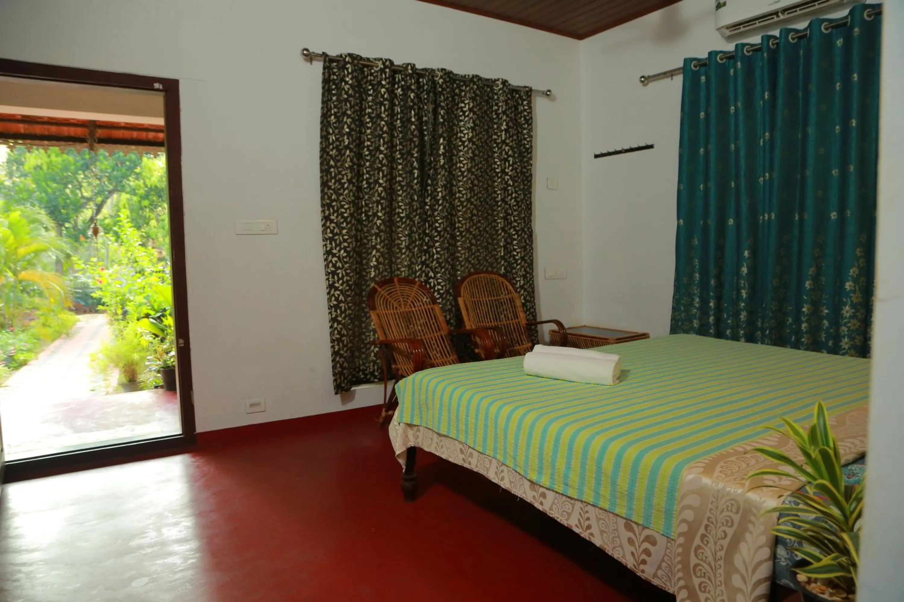 Bed in Marari Charlys Homestay