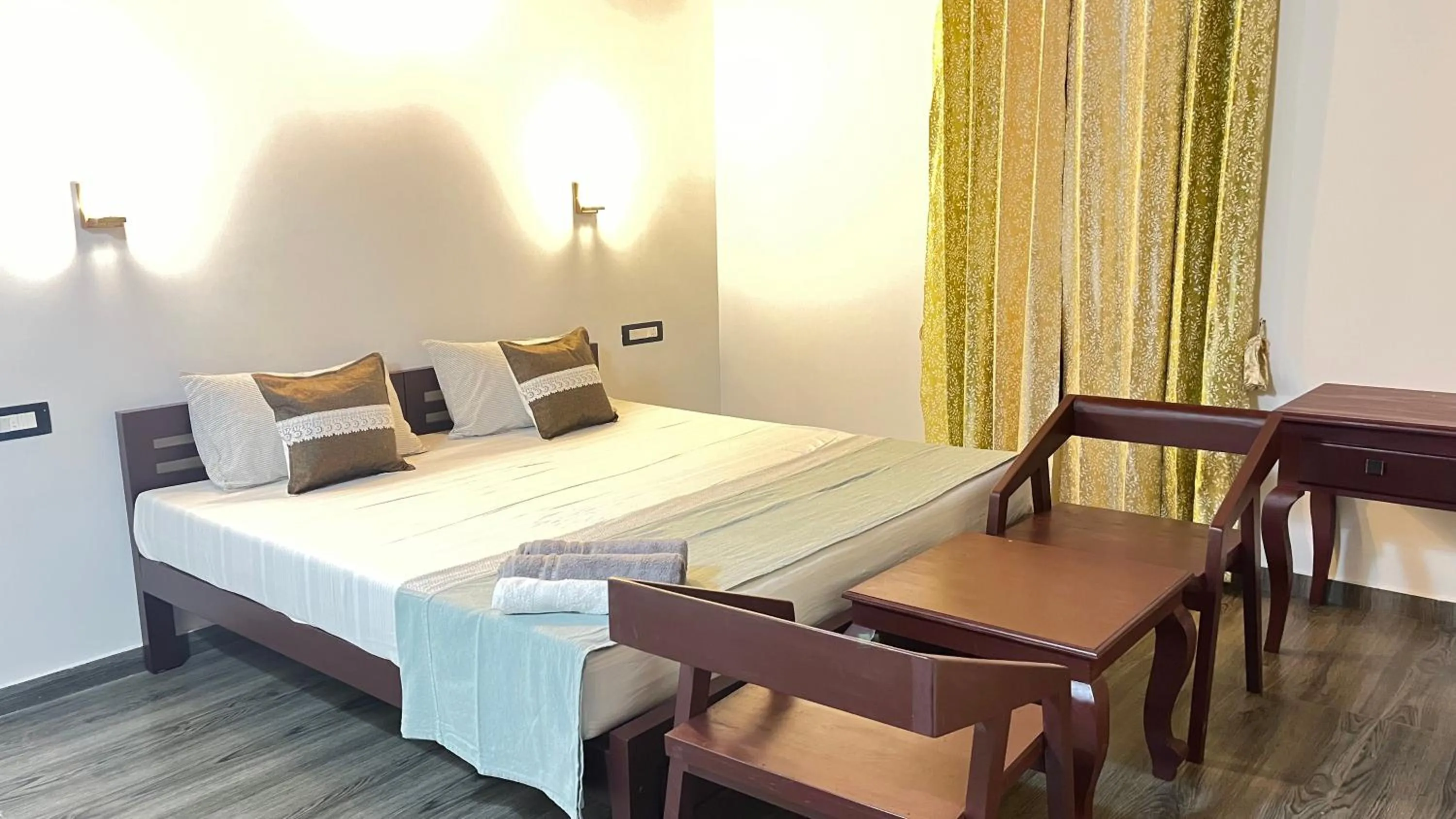 Bed in Marari Charlys Homestay