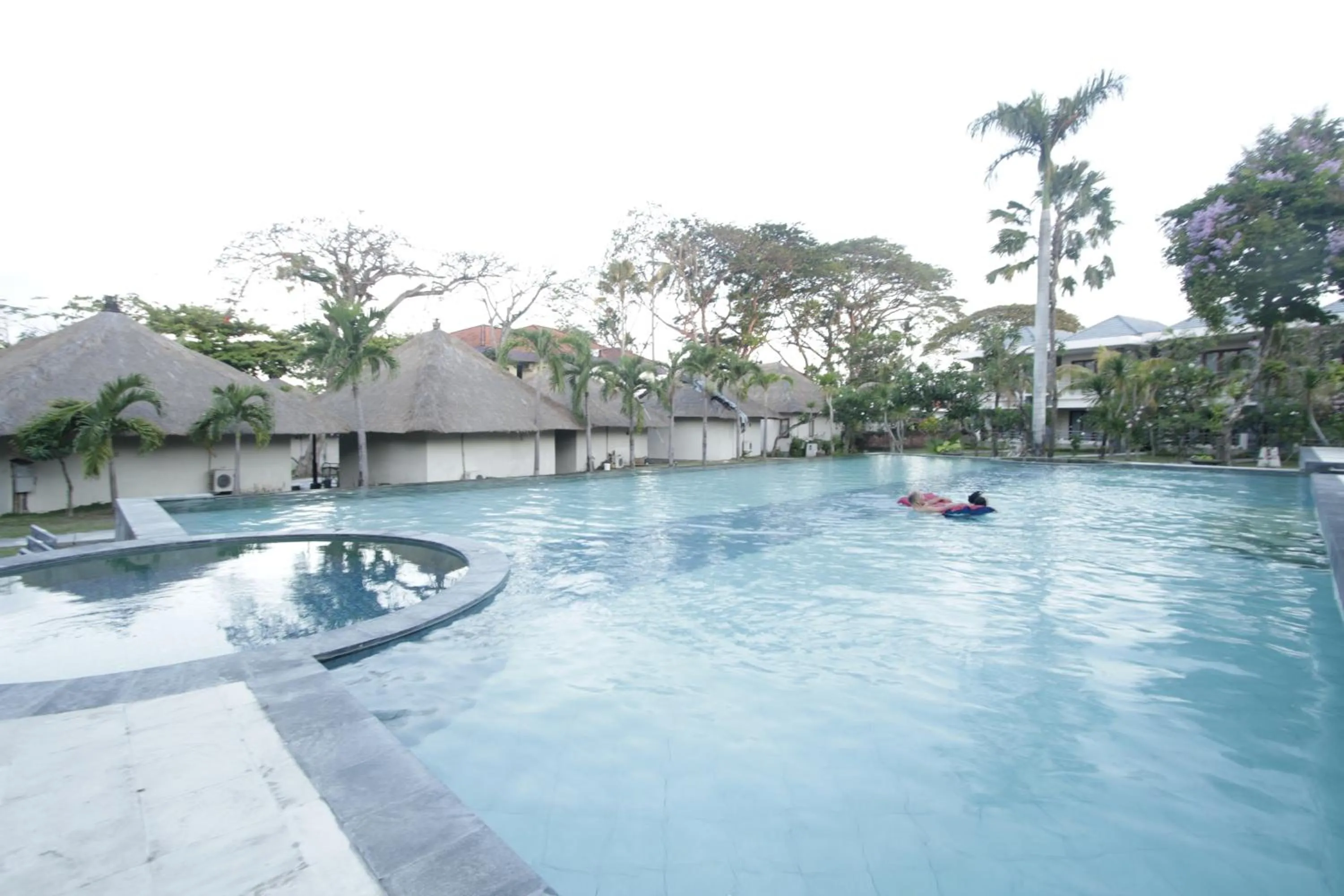 Swimming pool in Alit Beach Resort and Villas