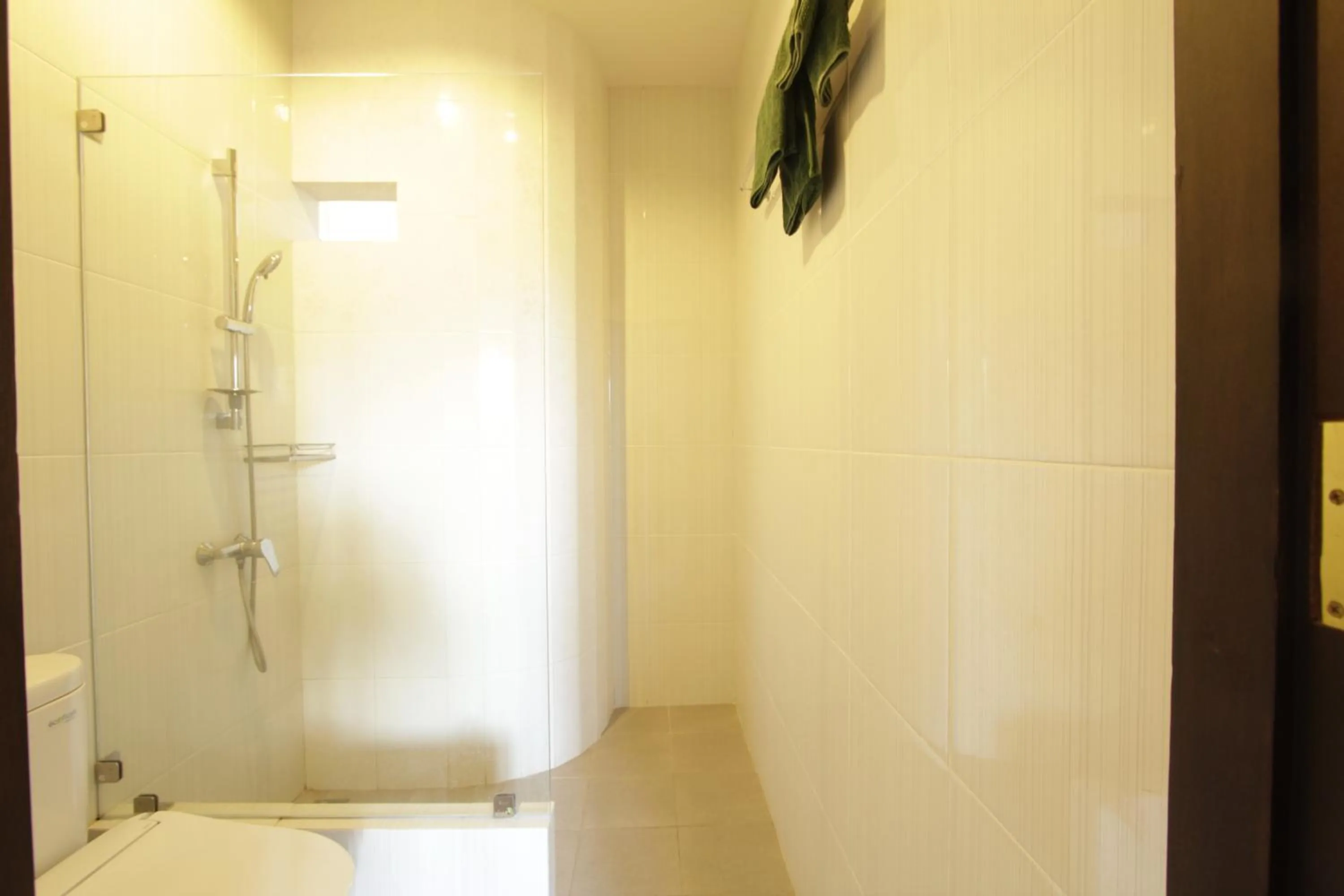 Bathroom in Alit Beach Resort and Villas