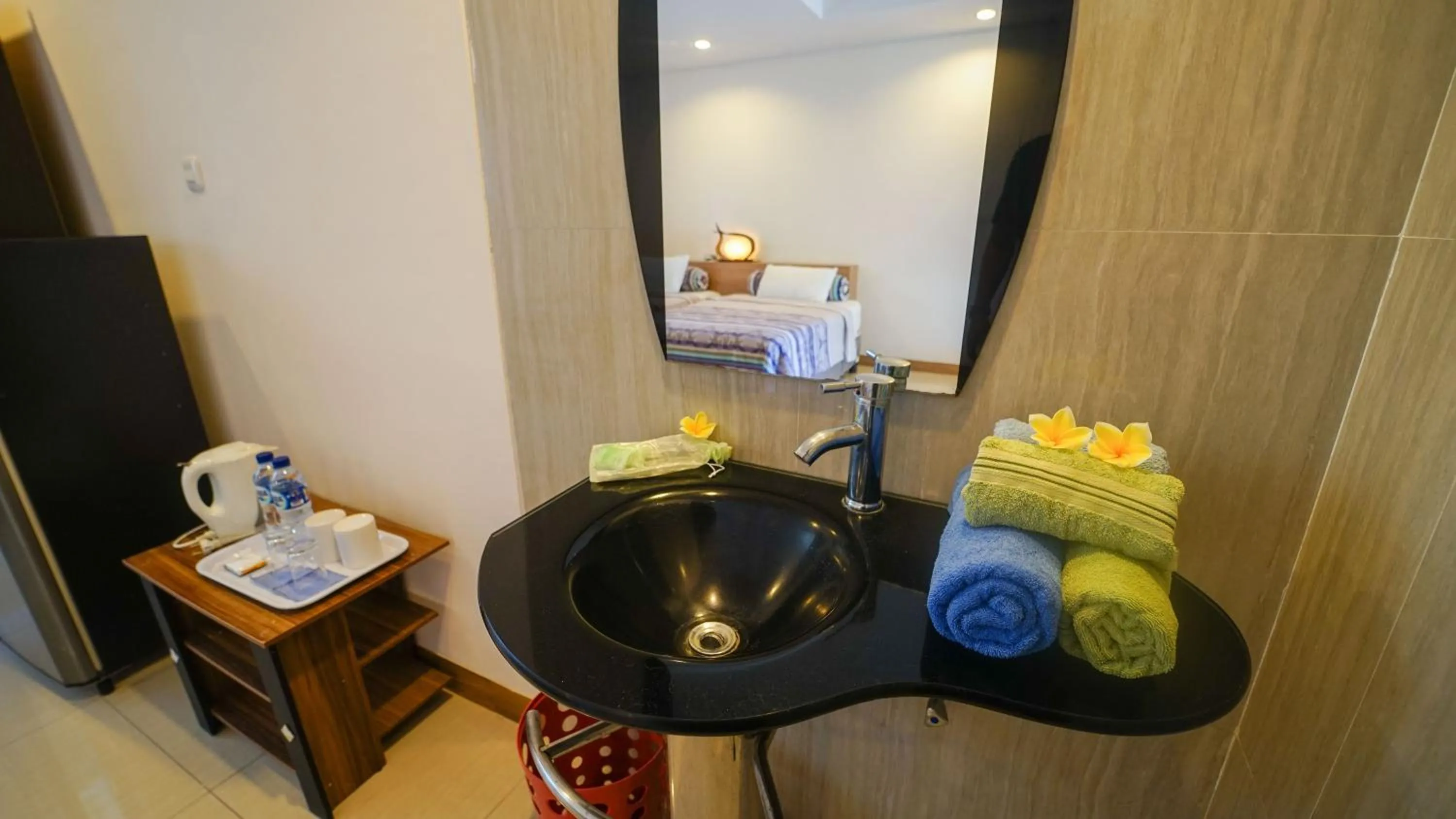 Bathroom, Bed in Alit Beach Resort and Villas