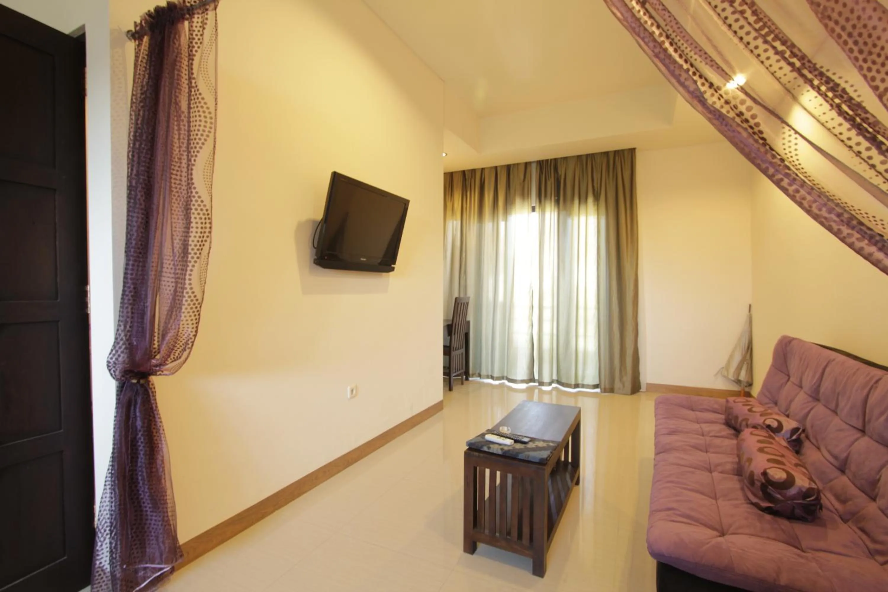 Bedroom in Alit Beach Resort and Villas