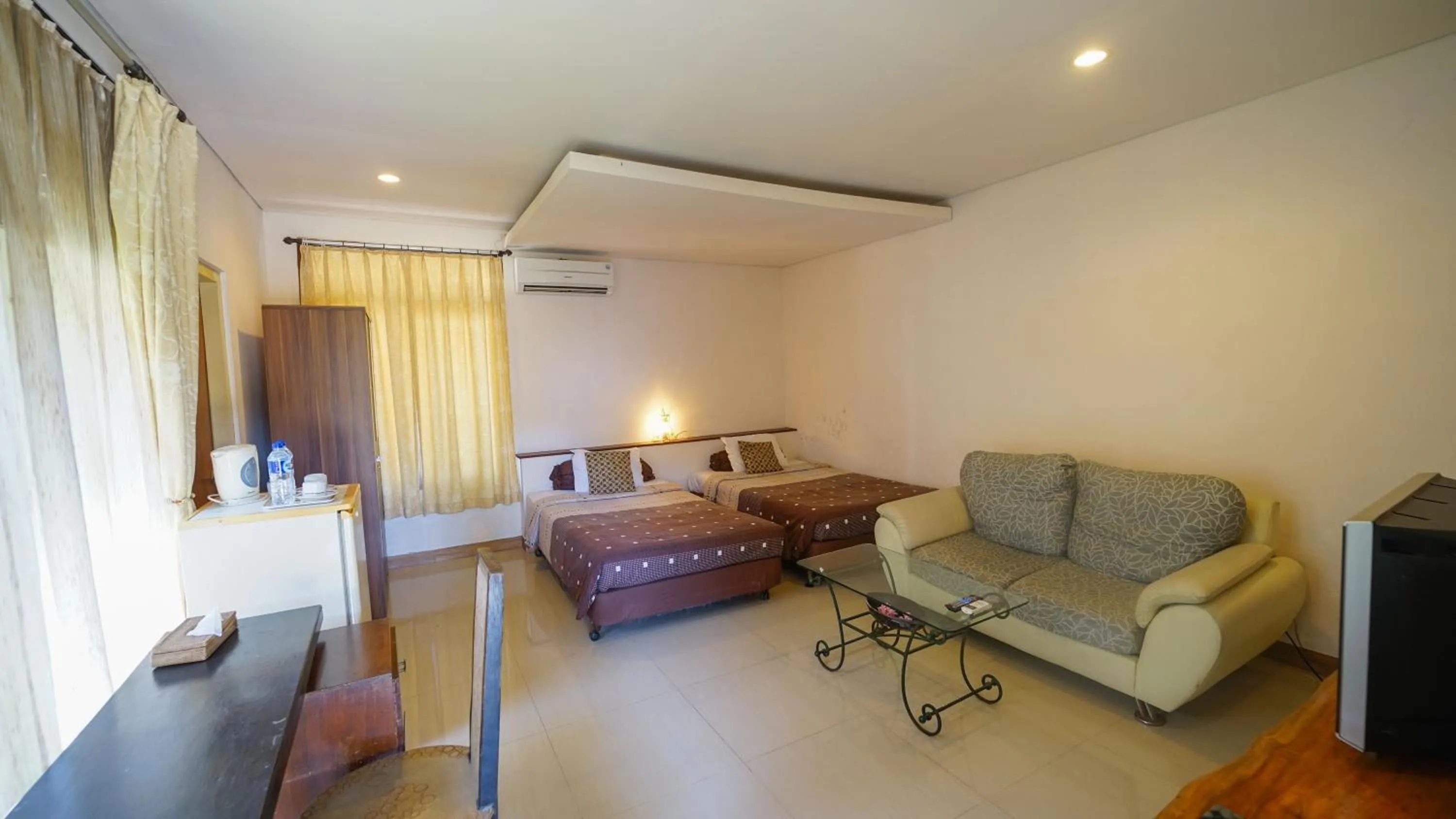 Bedroom in Alit Beach Resort and Villas