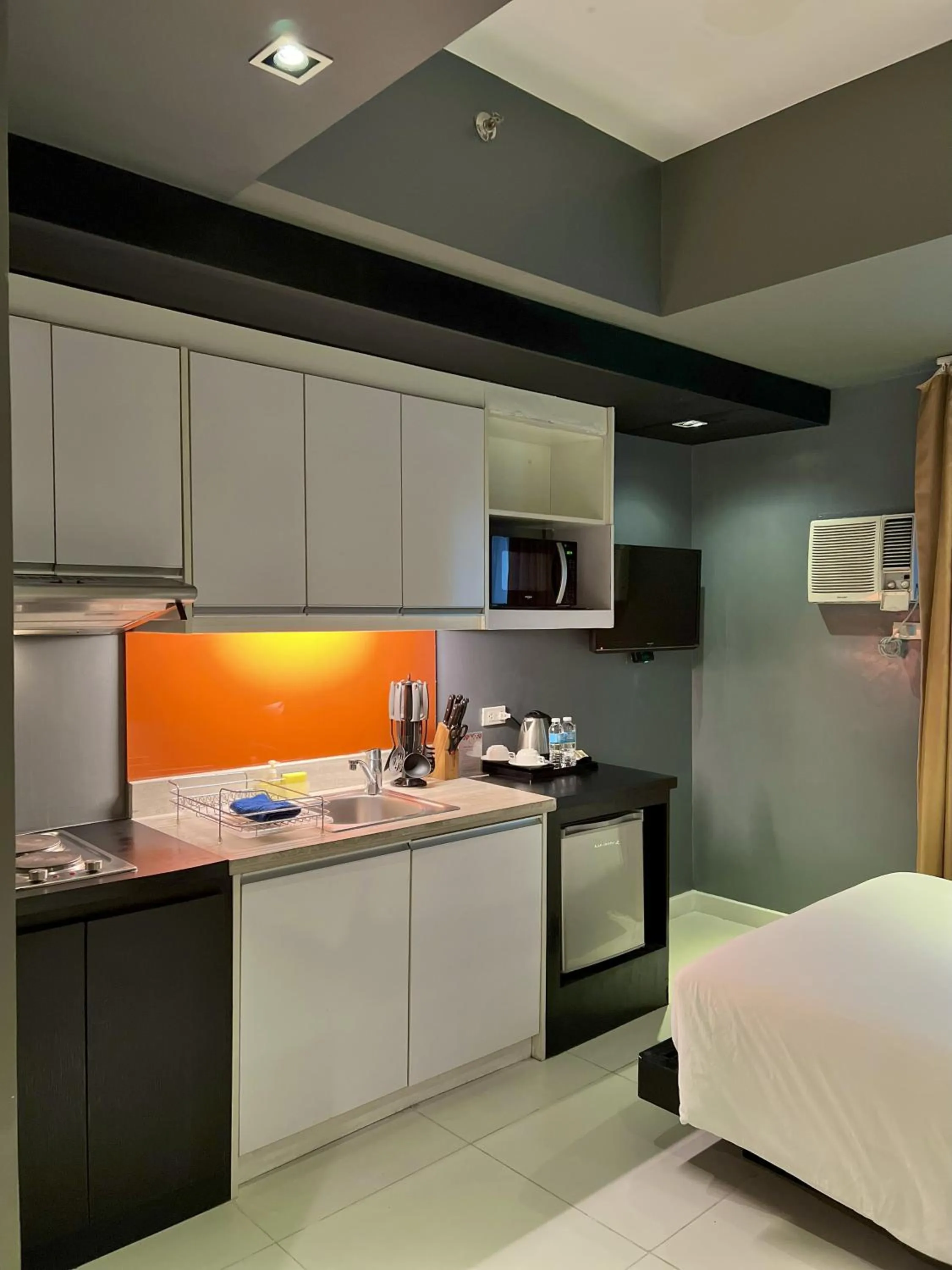 Kitchen or kitchenette, Bed in KL Serviced Residences Managed by HII
