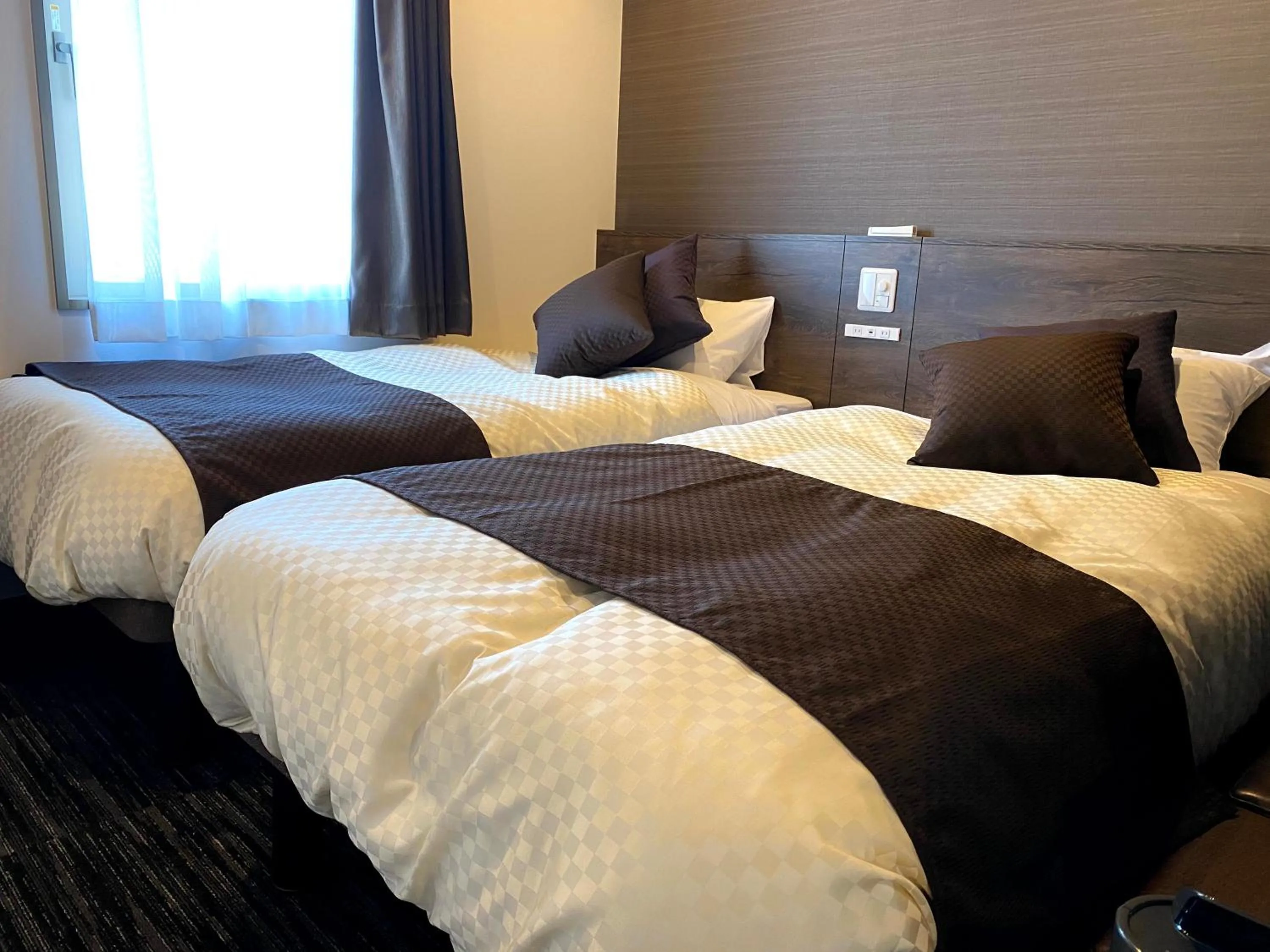 Bed in The CELECTON Abeno-Matsubara Ekimae