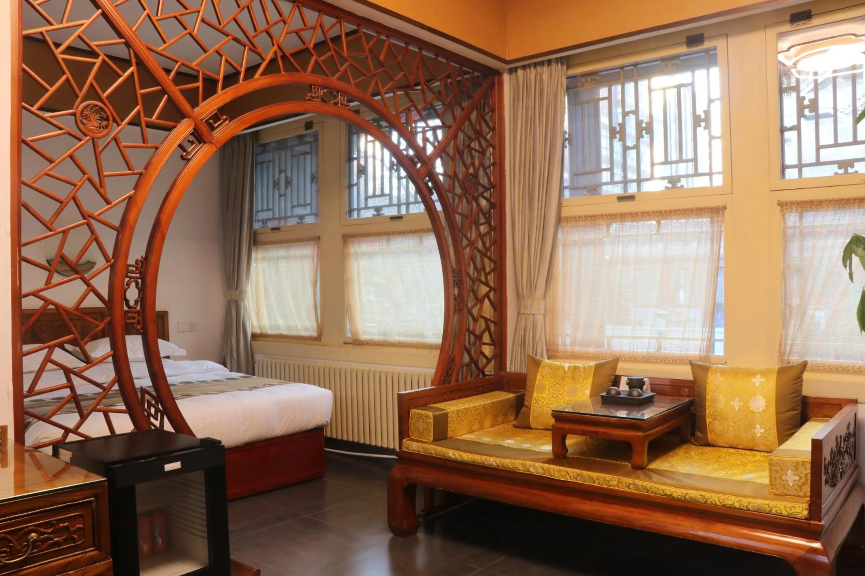 Bed in Beijing Jingyuan Courtyard Hotel