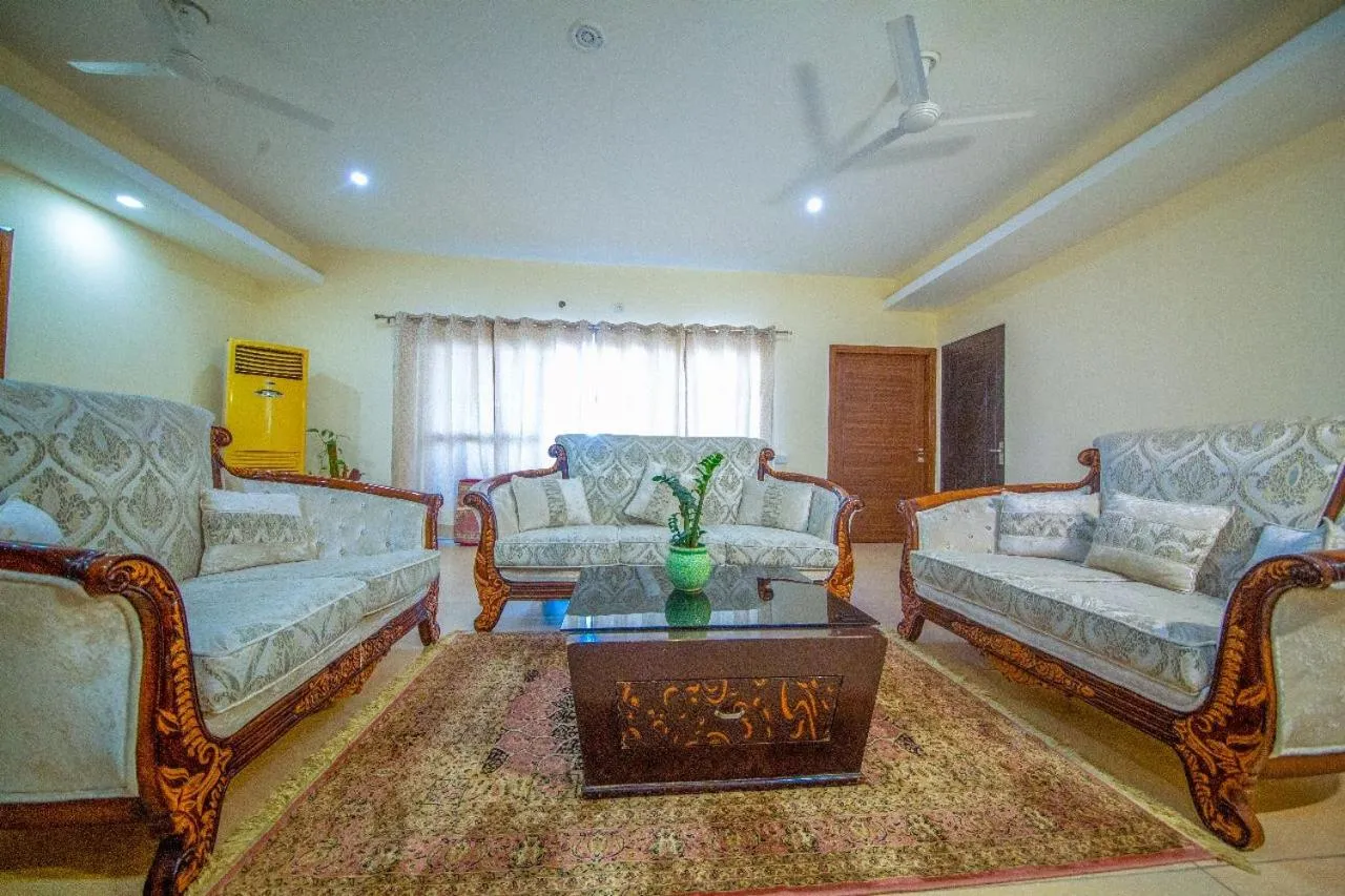 Living room, Bed in Golden Healing Journeys Homestay