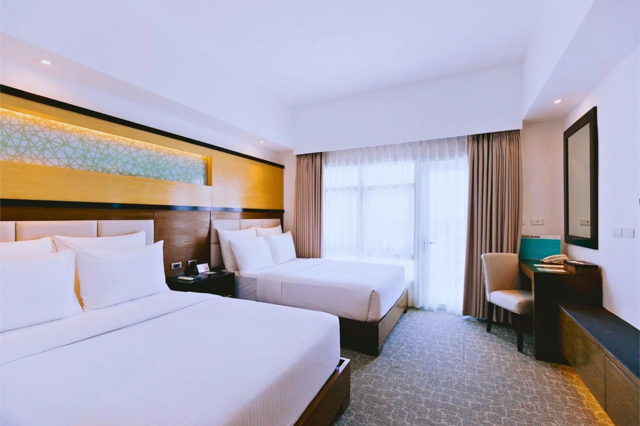 Bed in Arterra Seaview Resort