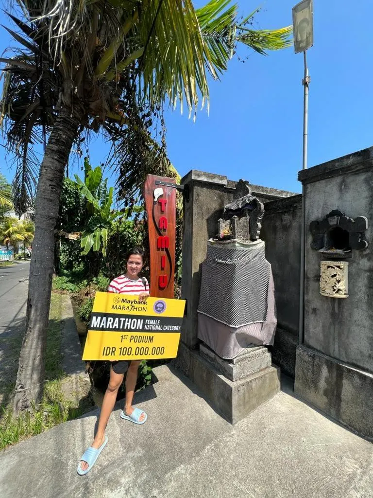 Property logo or sign in Tamiu Guesthouse at Desa Wisata Keramas Near Keramas Surf Beach