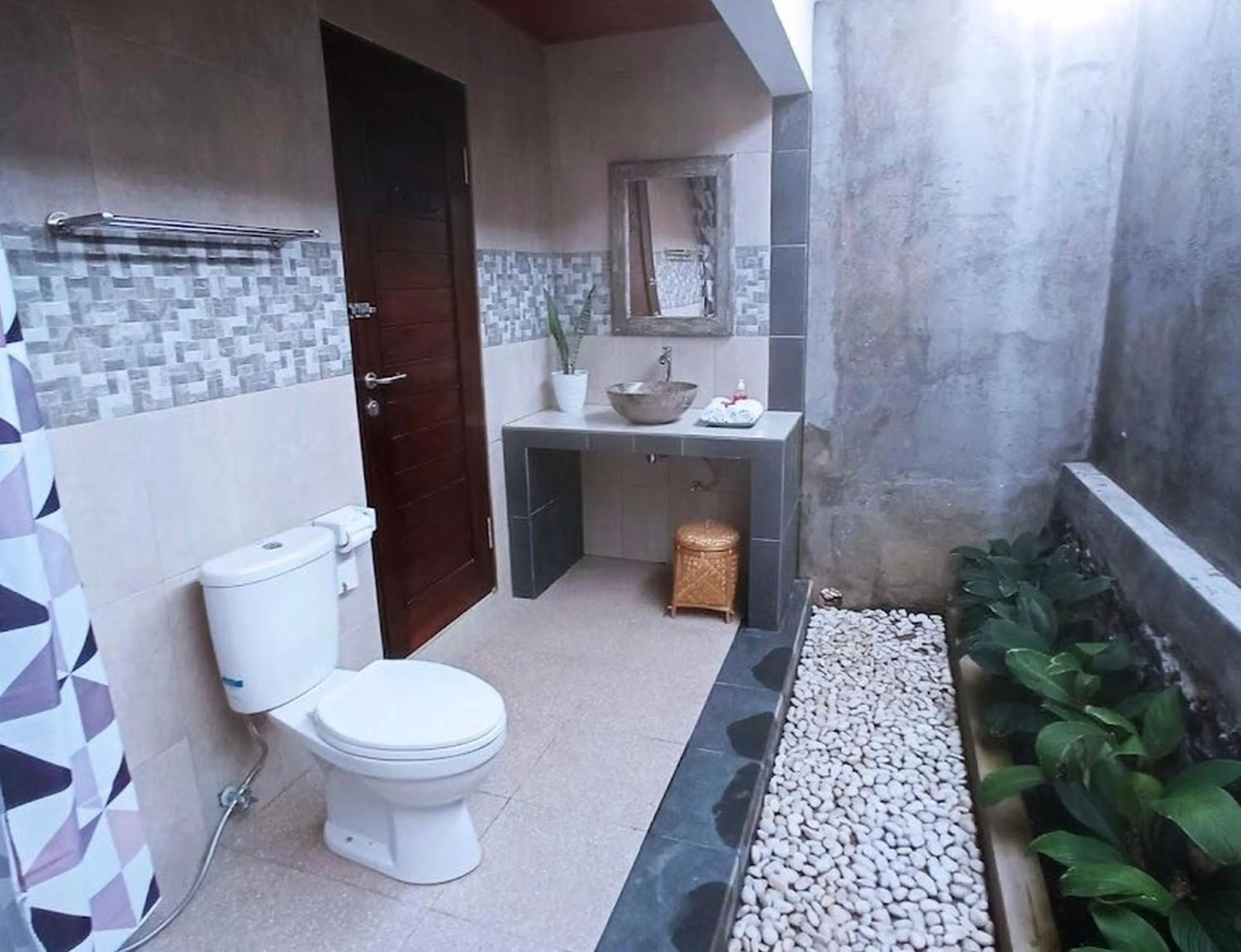 Bathroom in Tamiu Guesthouse at Desa Wisata Keramas Near Keramas Surf Beach