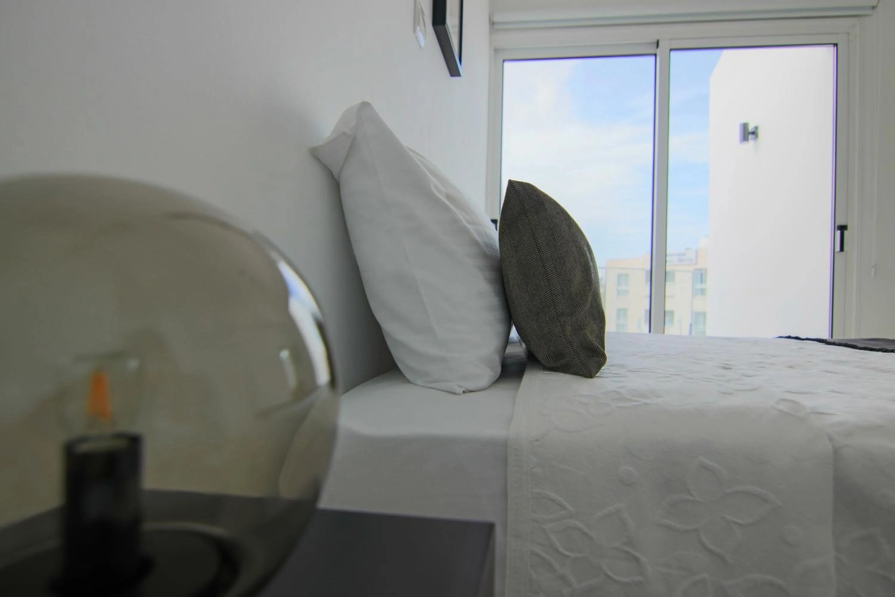 Bed in Phaedrus Living Seaside Junior Suite Lighthouse 63