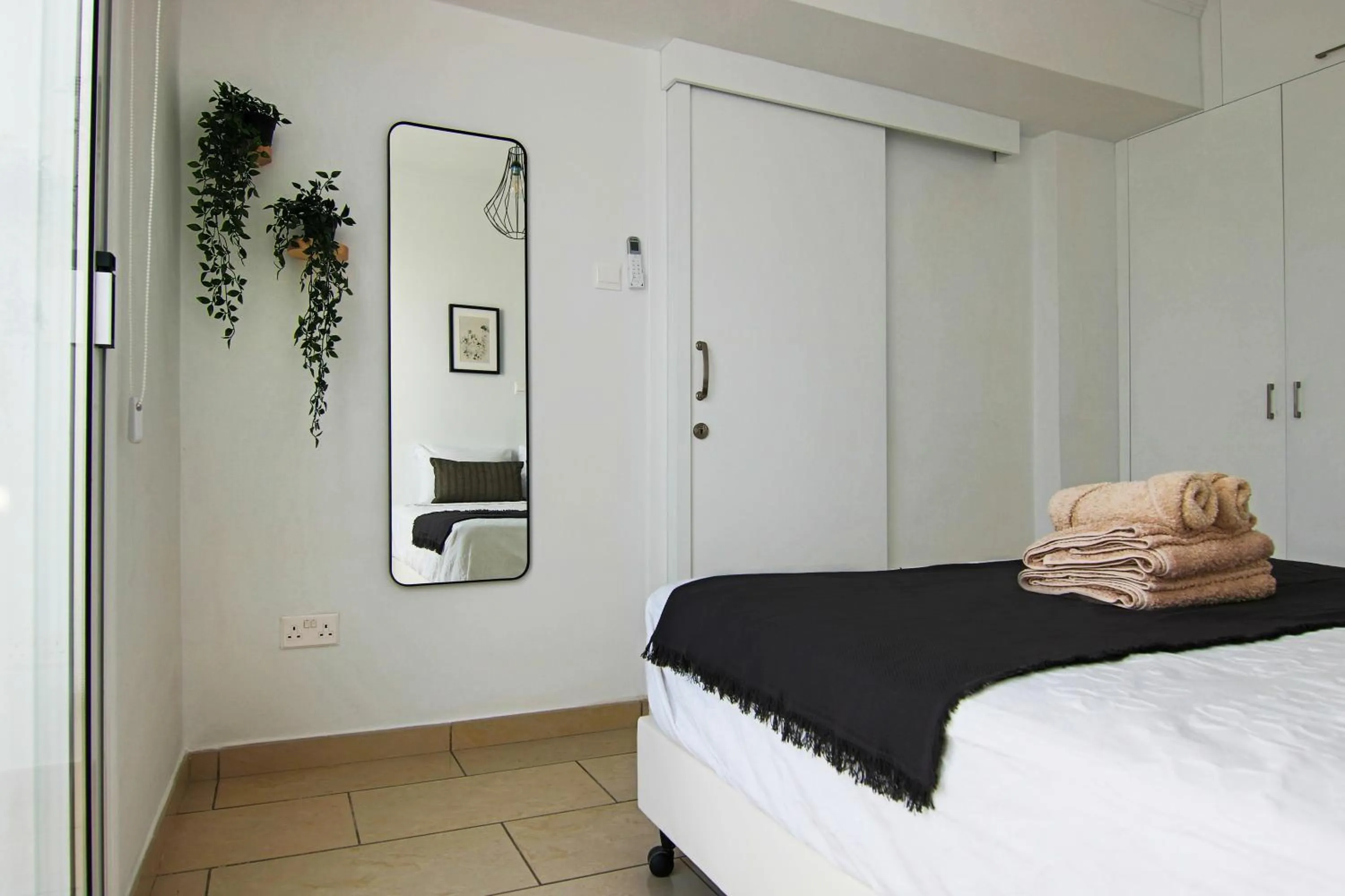 Bed in Phaedrus Living Seaside Junior Suite Lighthouse 63