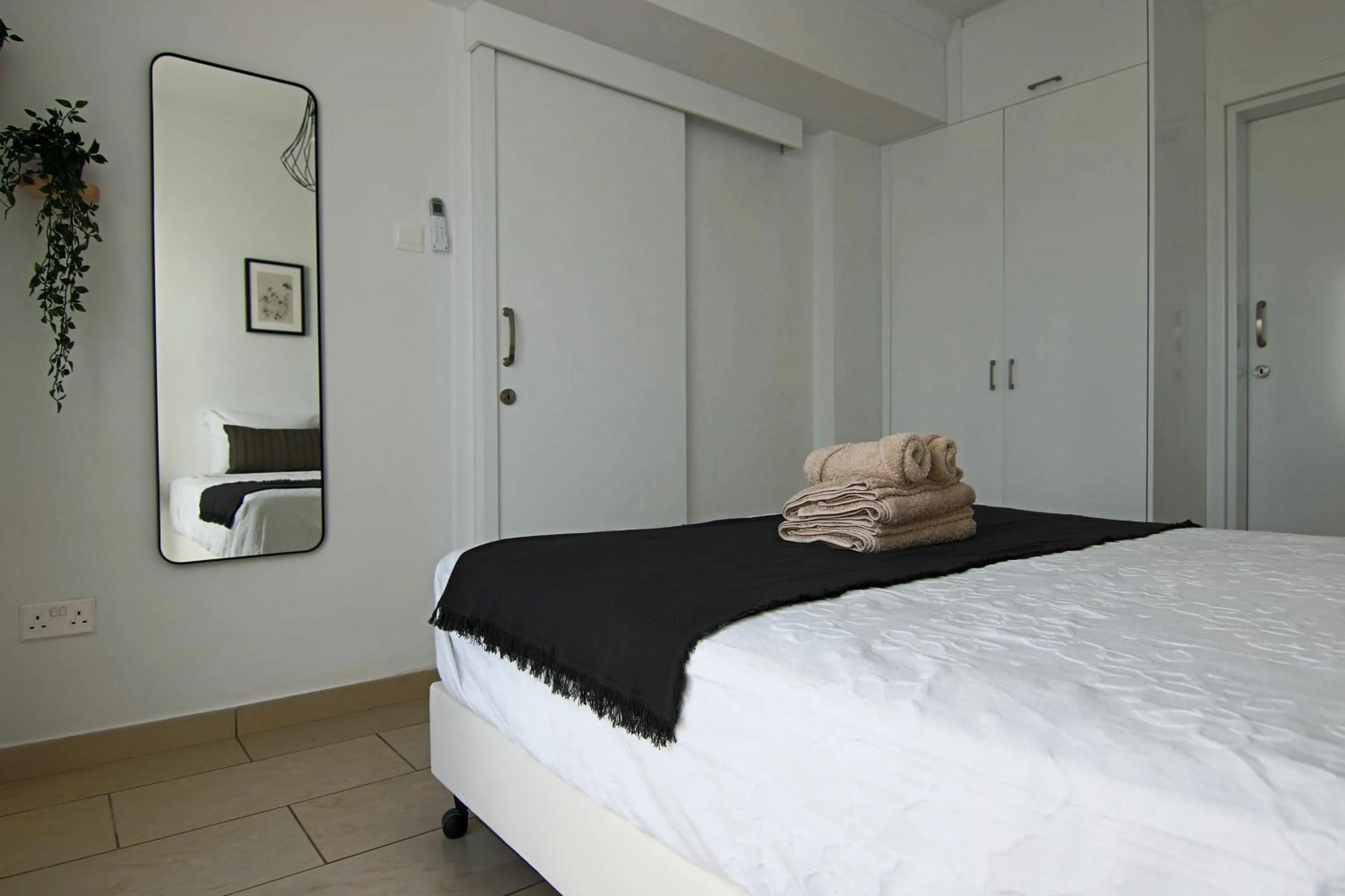 Bed in Phaedrus Living Seaside Junior Suite Lighthouse 63