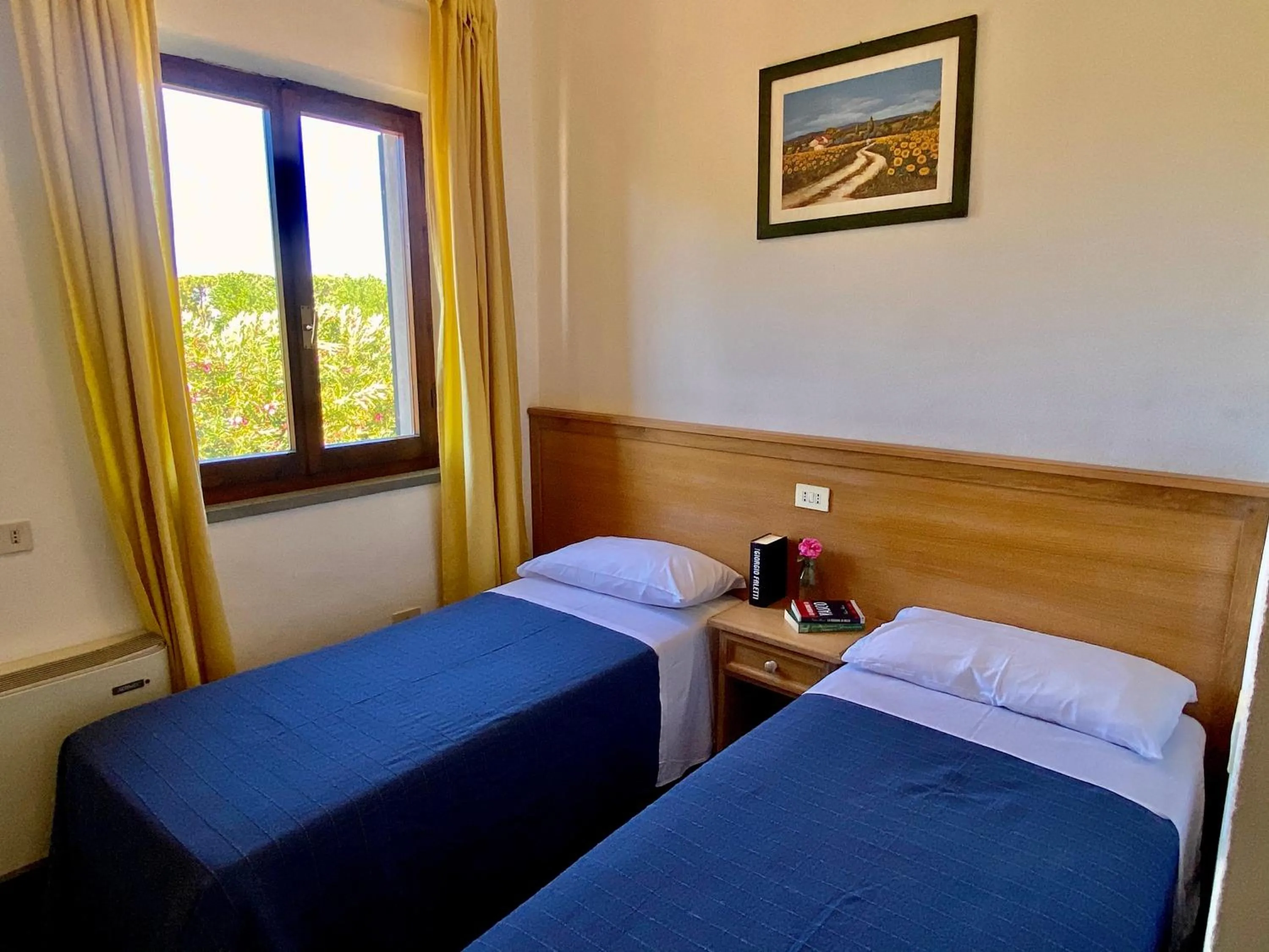Photo of the whole room, Bed in RESIDENCE TERME ISOLA D'ELBA SRL