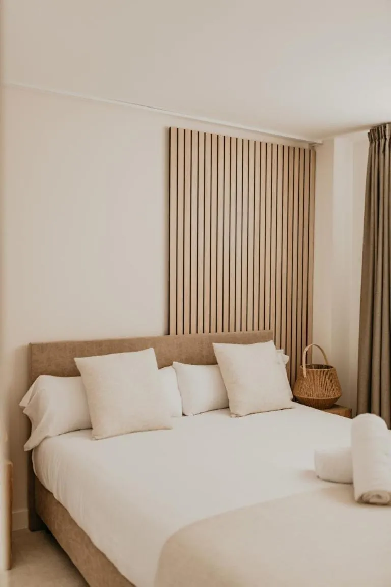 Bed in Portomar Apartments - 4-Star Superior Hotel