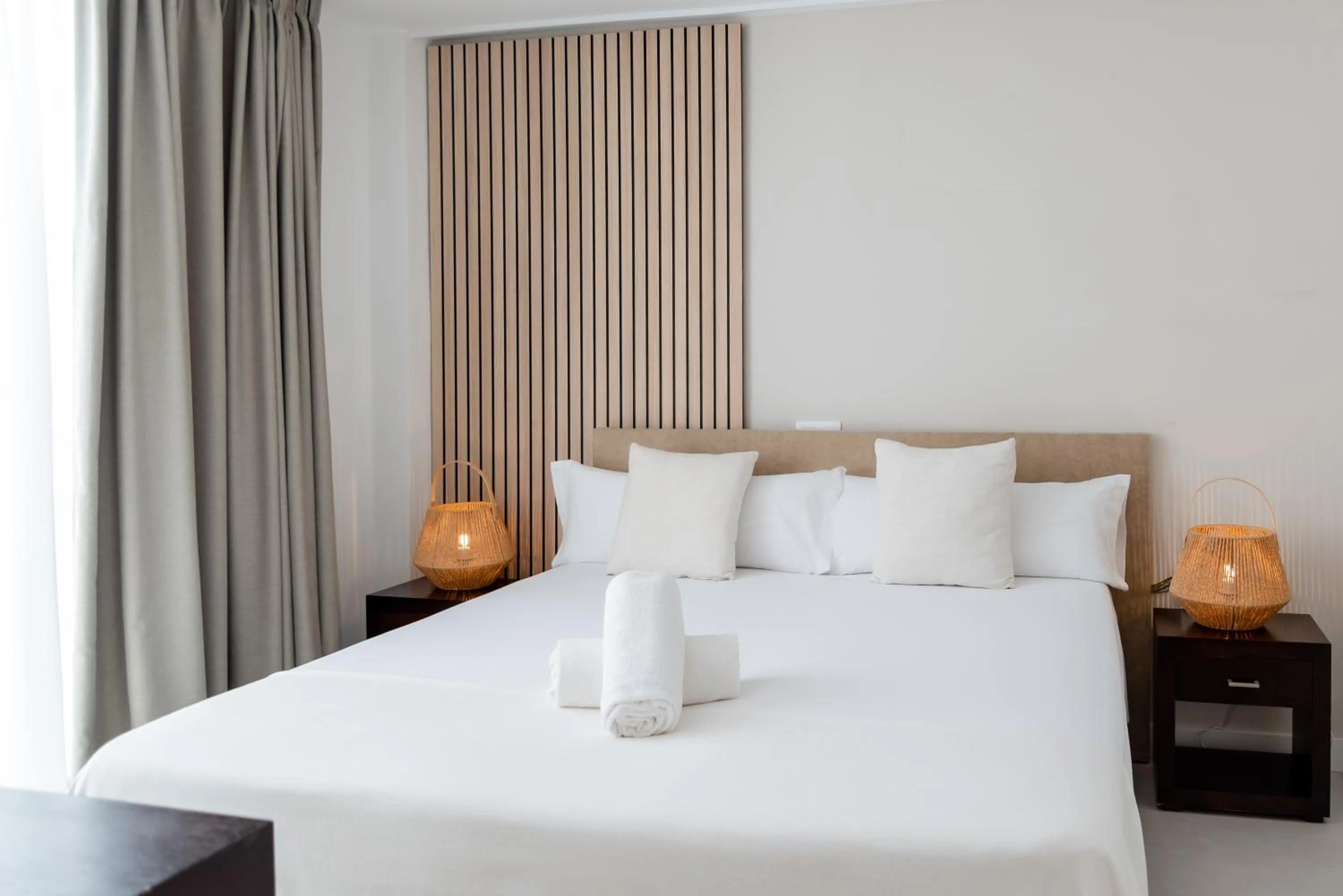 Bed in Portomar Apartments - 4-Star Superior Hotel