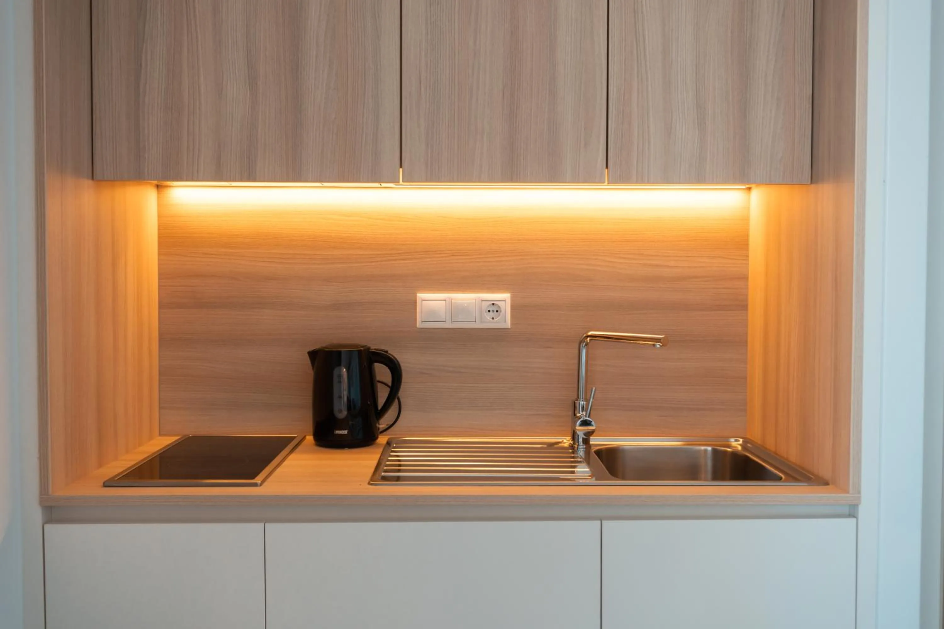 Kitchen or kitchenette in Portomar Apartments - 4-Star Superior Hotel