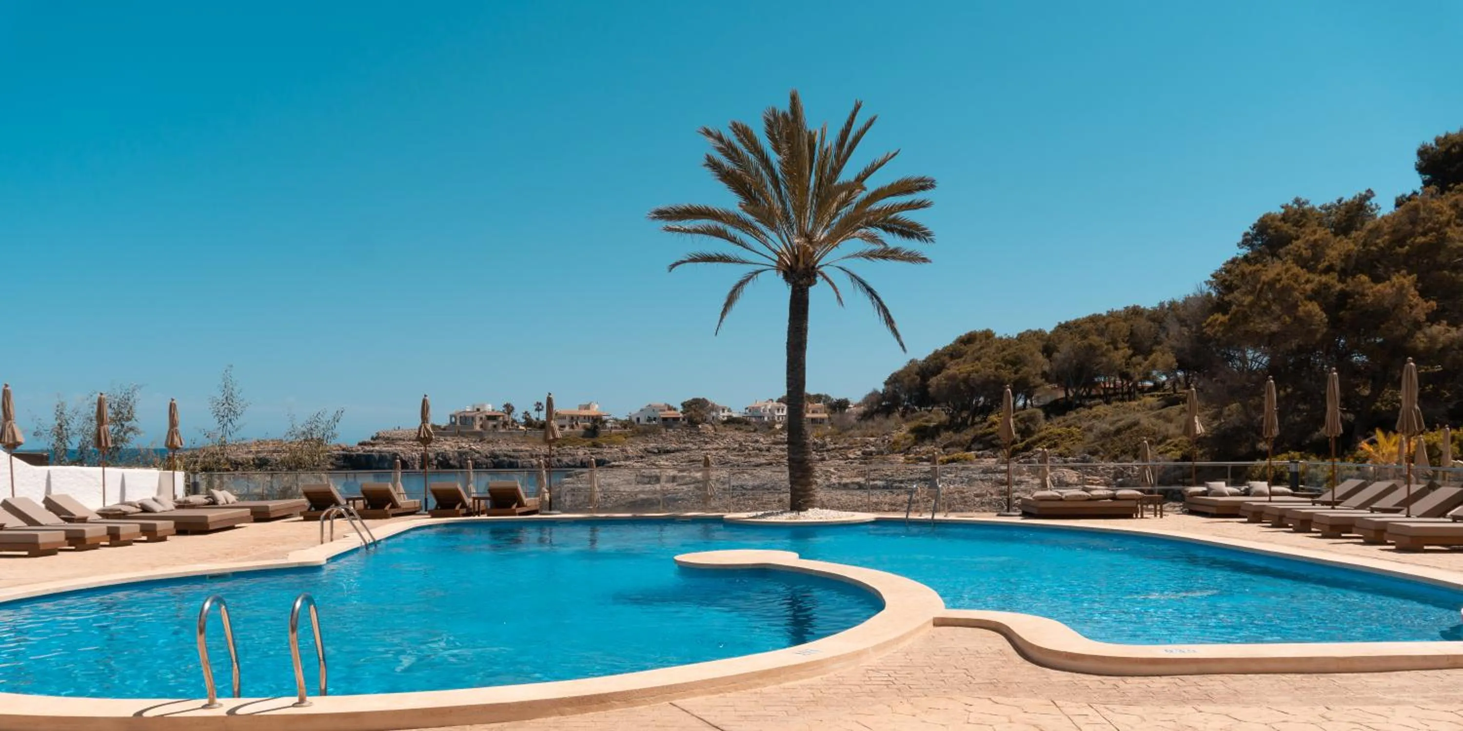 Swimming pool in Portomar Apartments - 4-Star Superior Hotel