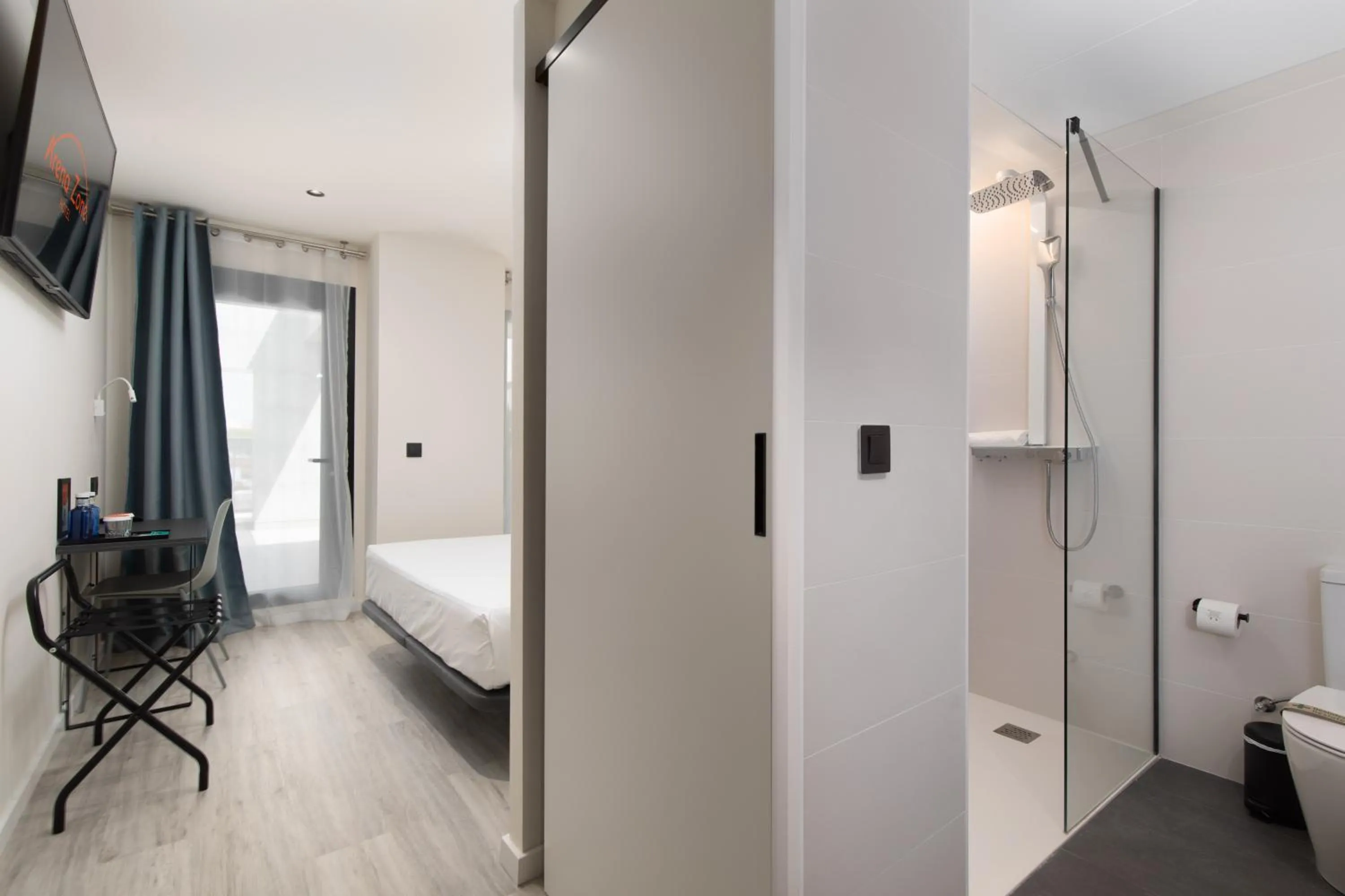 Bathroom, Bed in Arena Zone Hotel