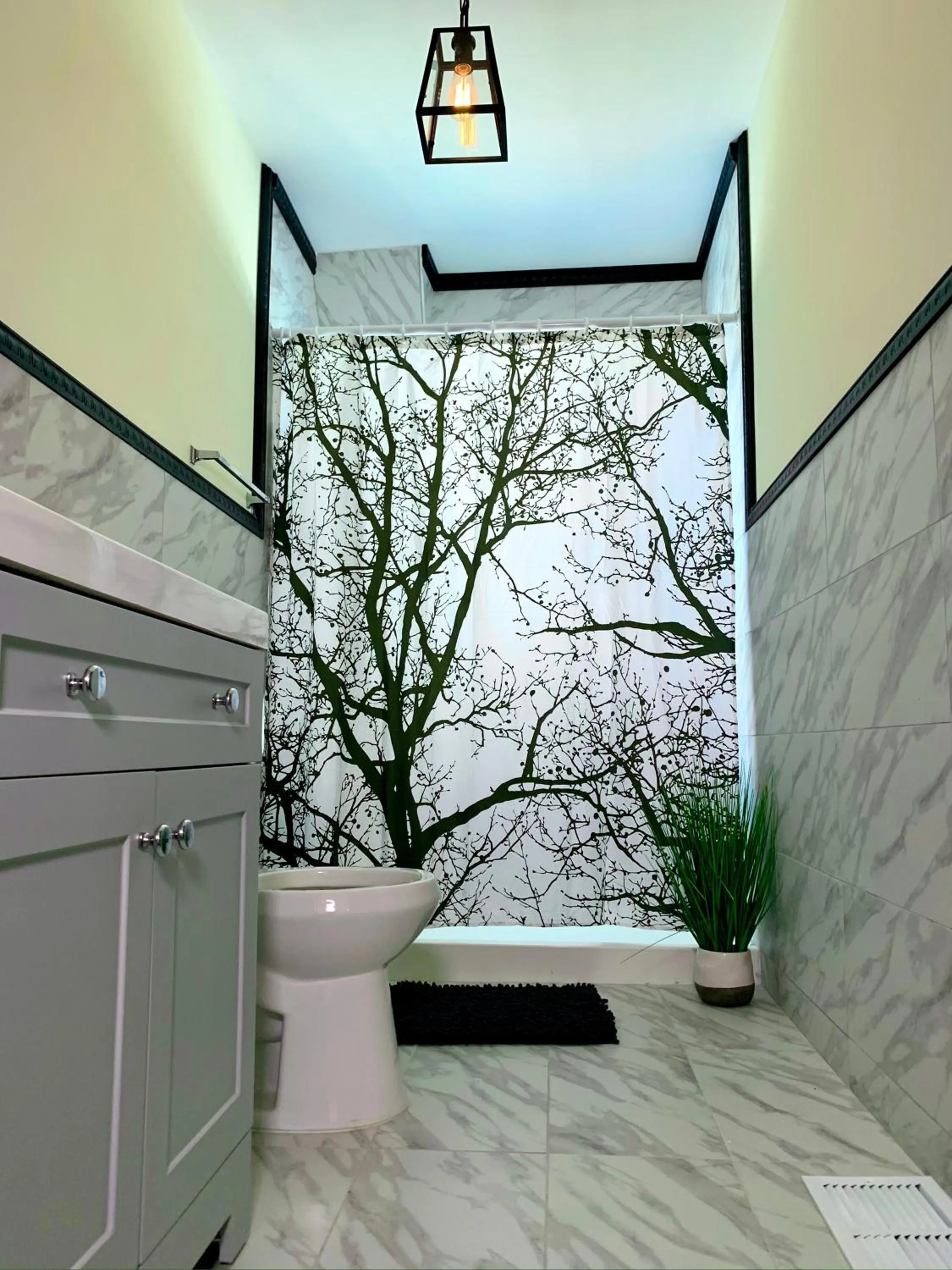 Bathroom in The Iron Scow - With Private Yard & Free Parking, Minutes From Falls & Casino by Niagara Hospitality