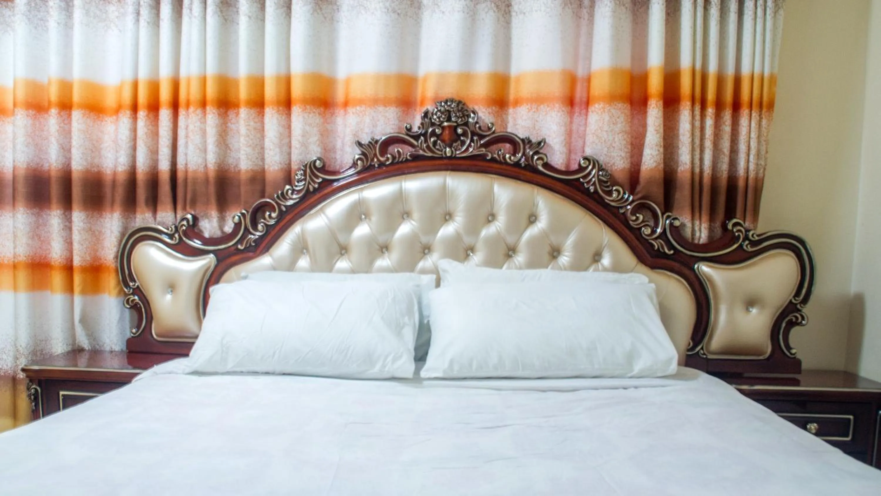 Bed in Bona Safari Villa Bunamwaya