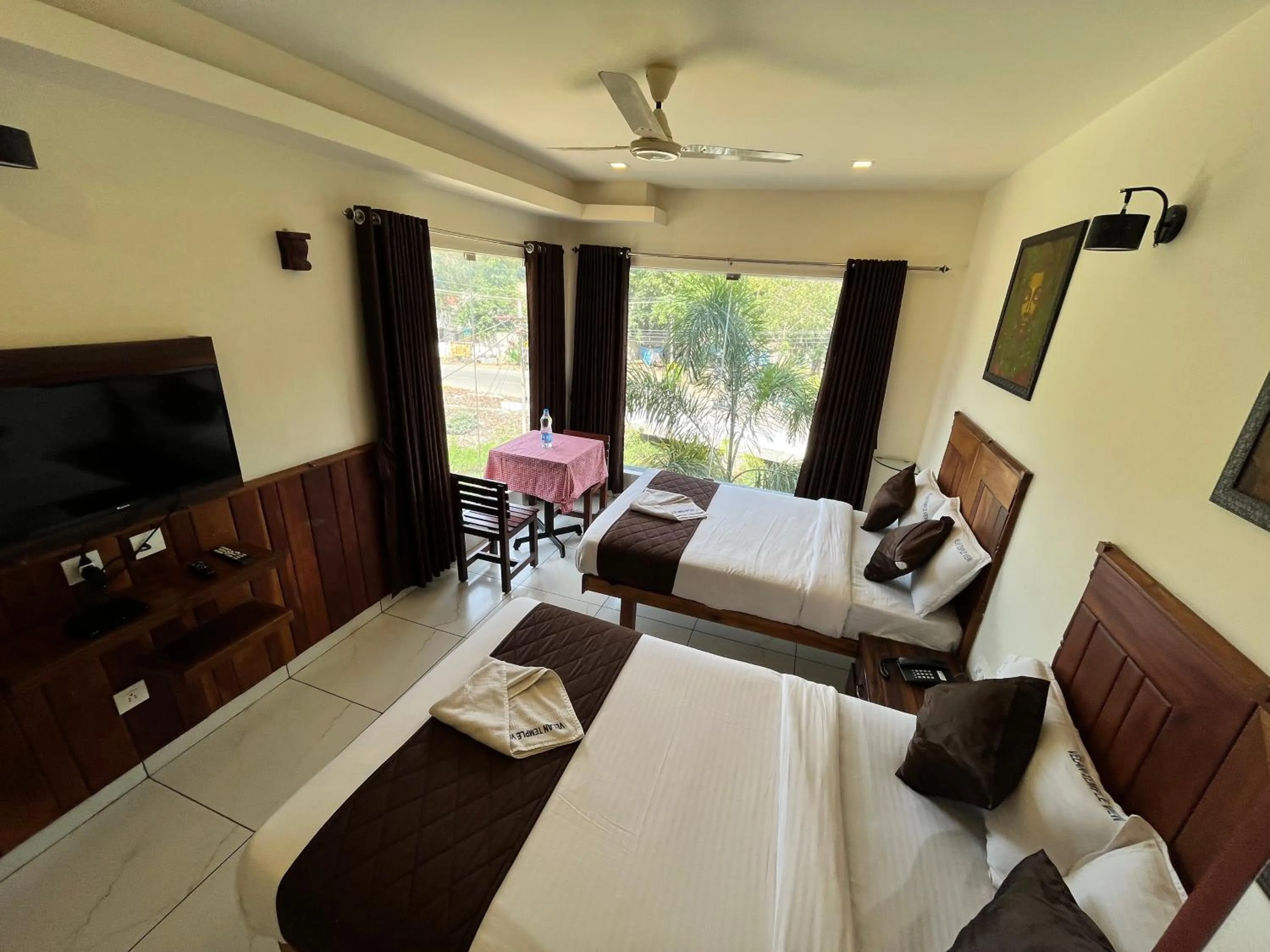 Photo of the whole room, Bed in Velan Temple View