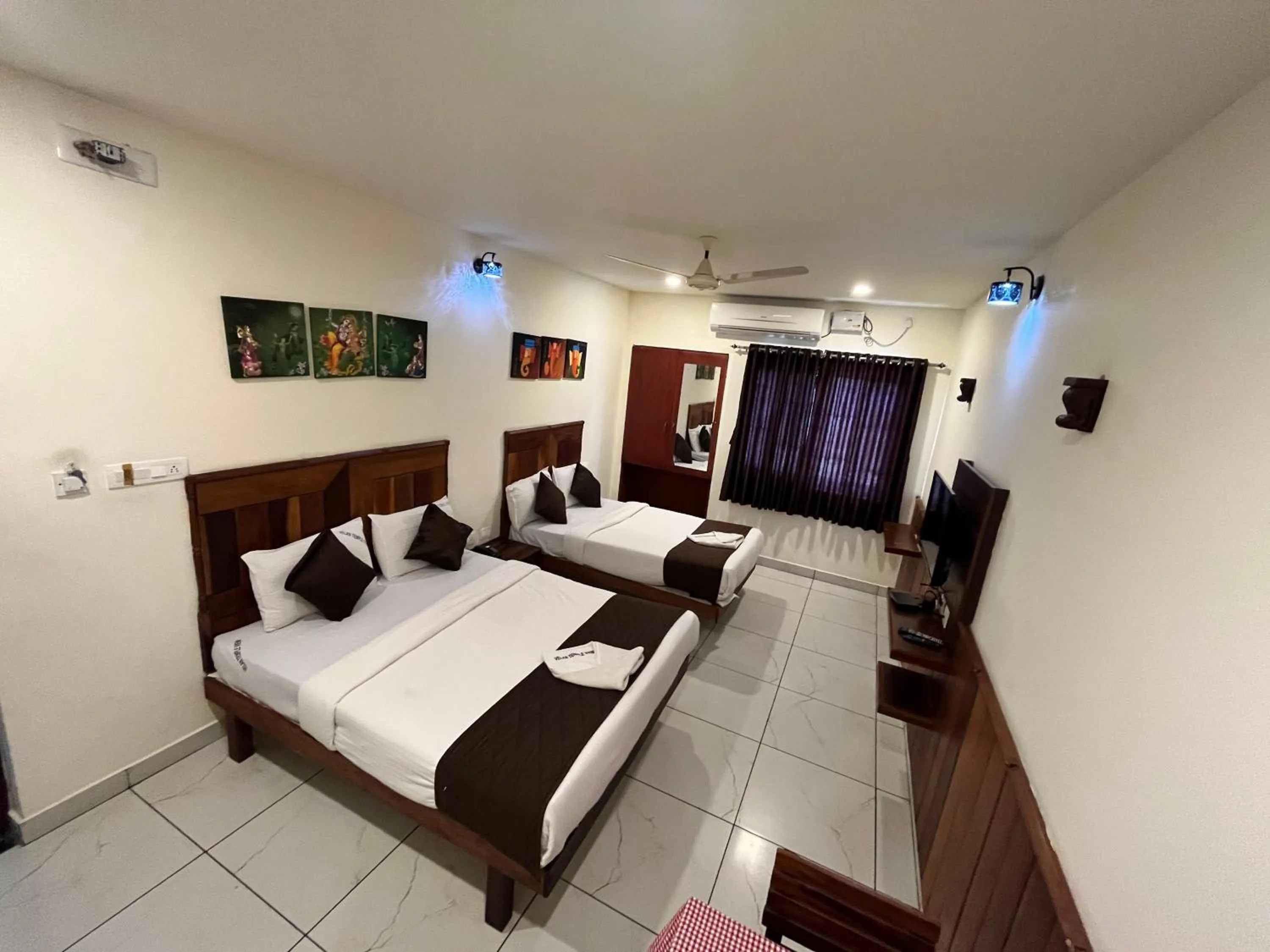 Photo of the whole room, Bed in Velan Temple View