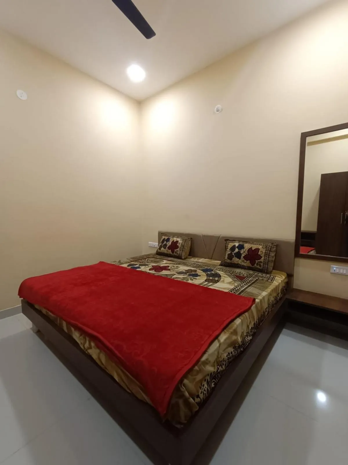 Bed in Vijayam Resort
