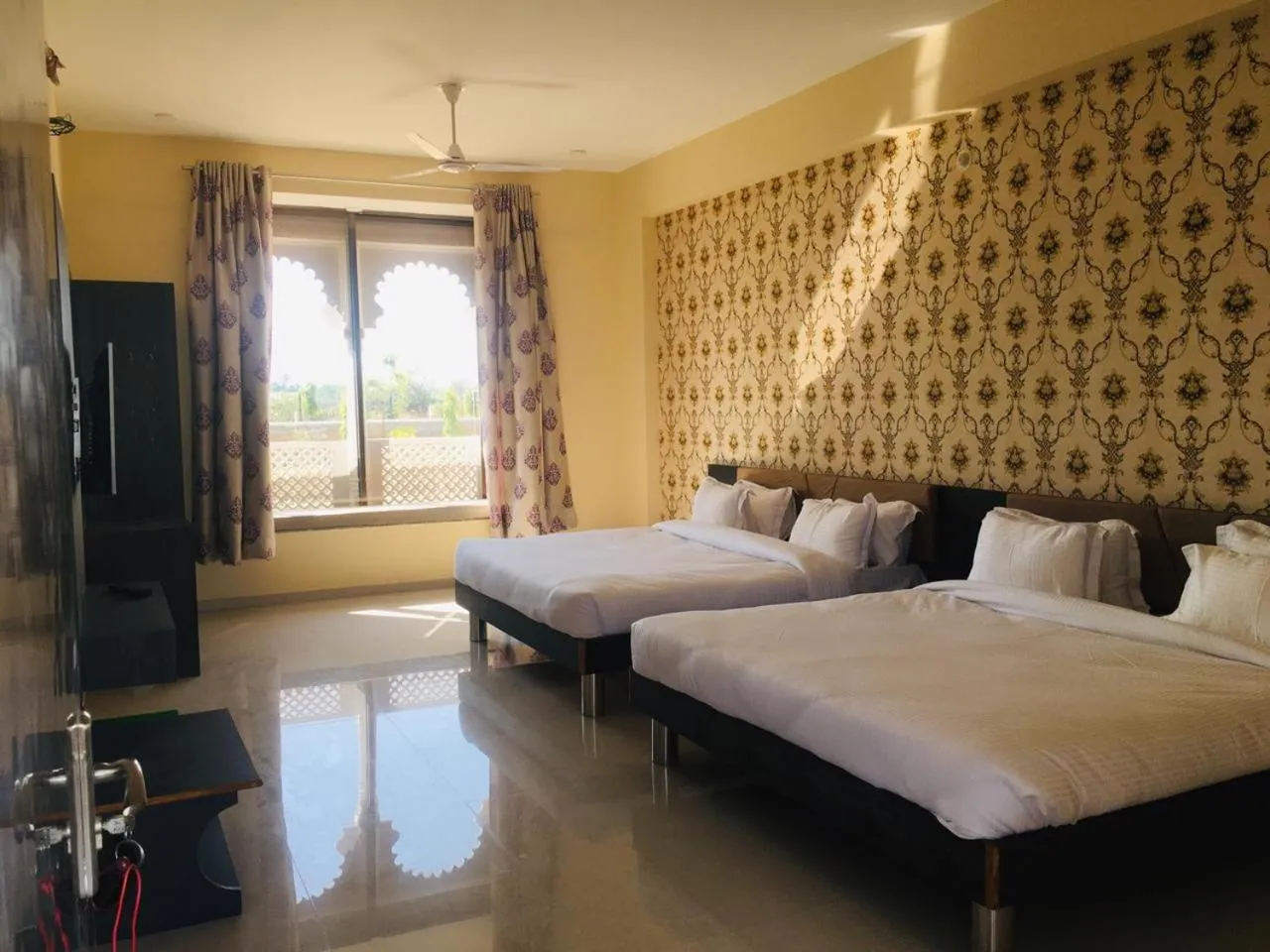 Bed in Vijayam Resort