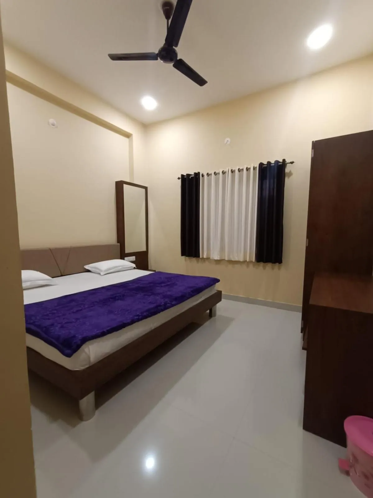 Bed in Vijayam Resort