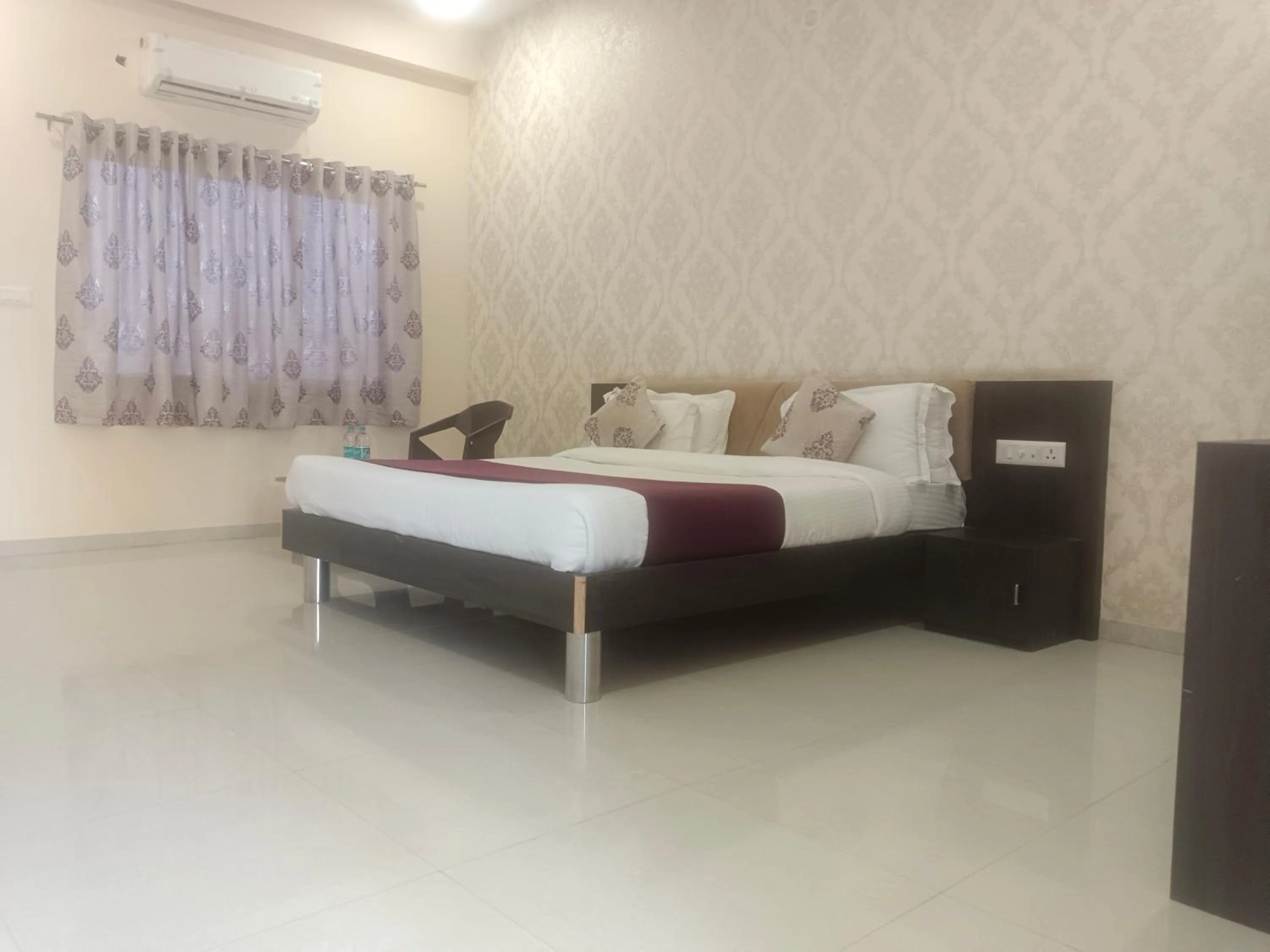 Bed in Vijayam Resort