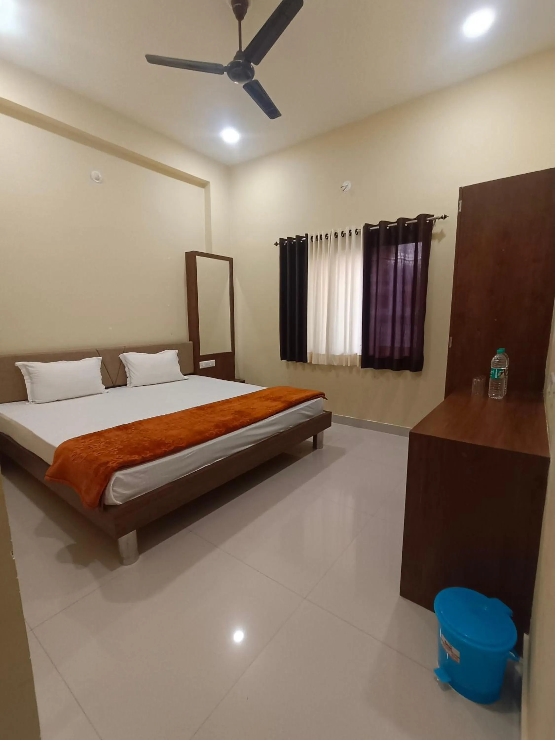 Bed in Vijayam Resort