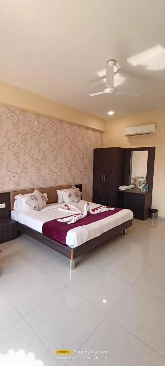 Bed in Vijayam Resort