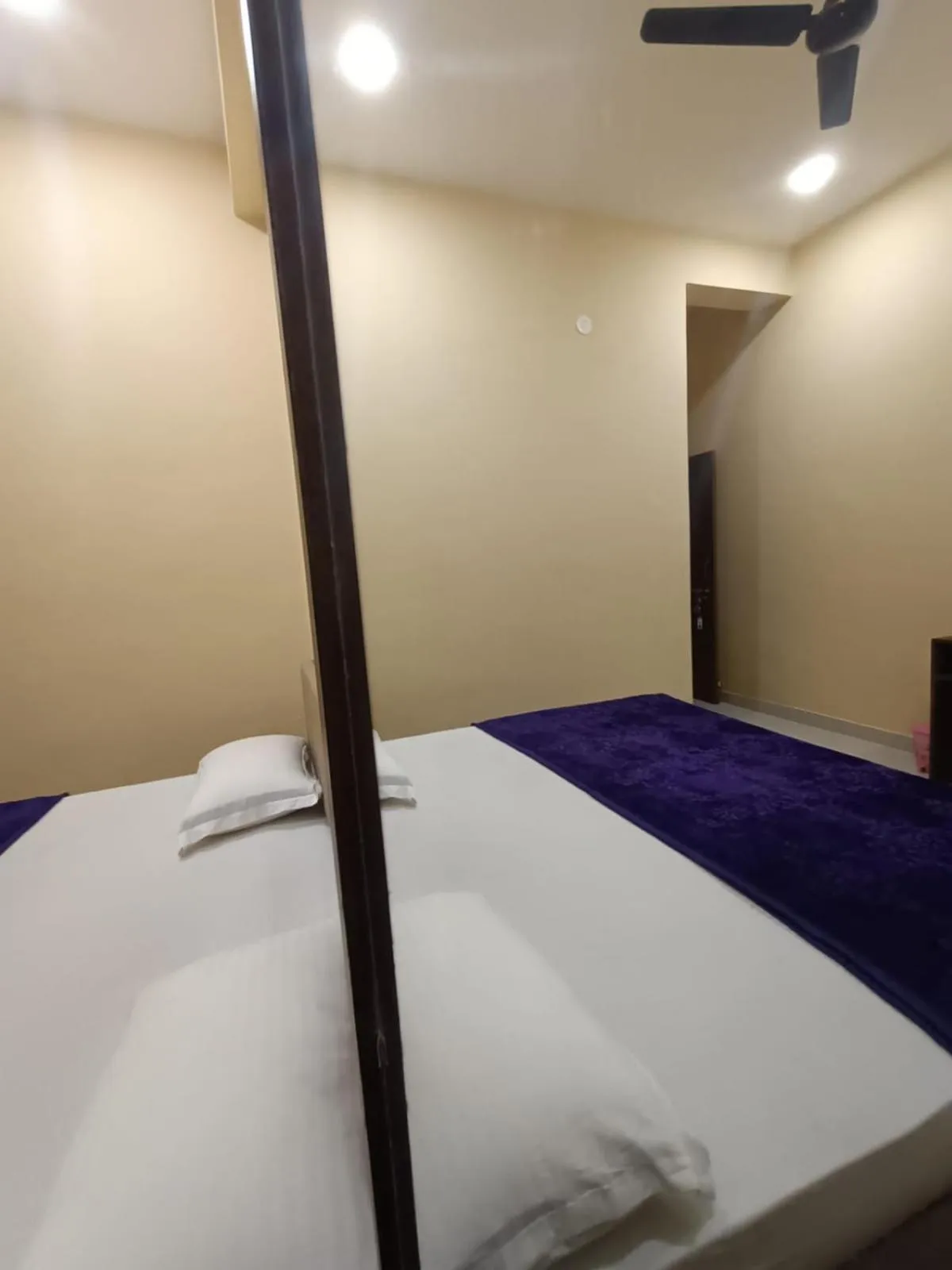 Bed in Vijayam Resort