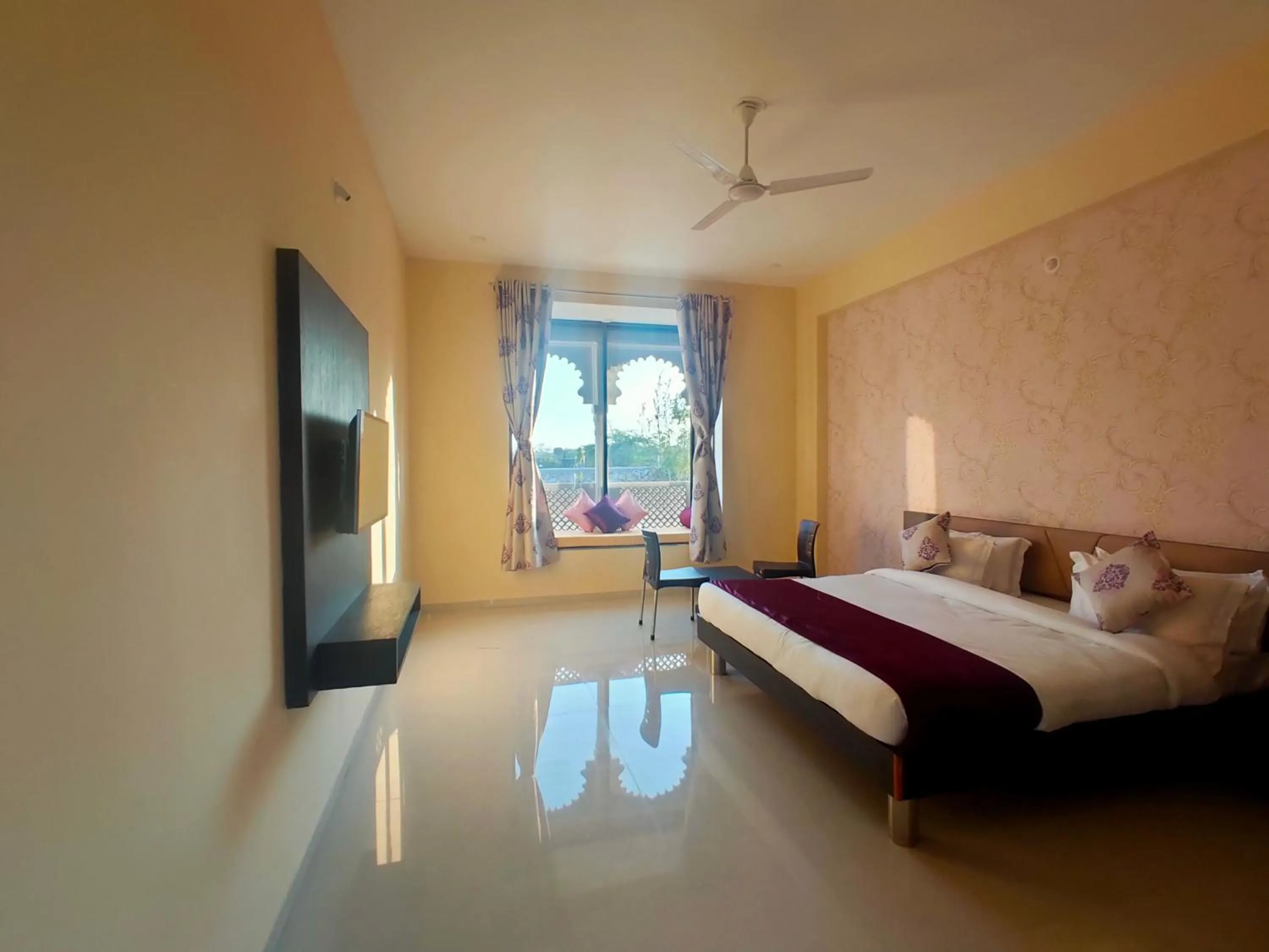 Bed in Vijayam Resort