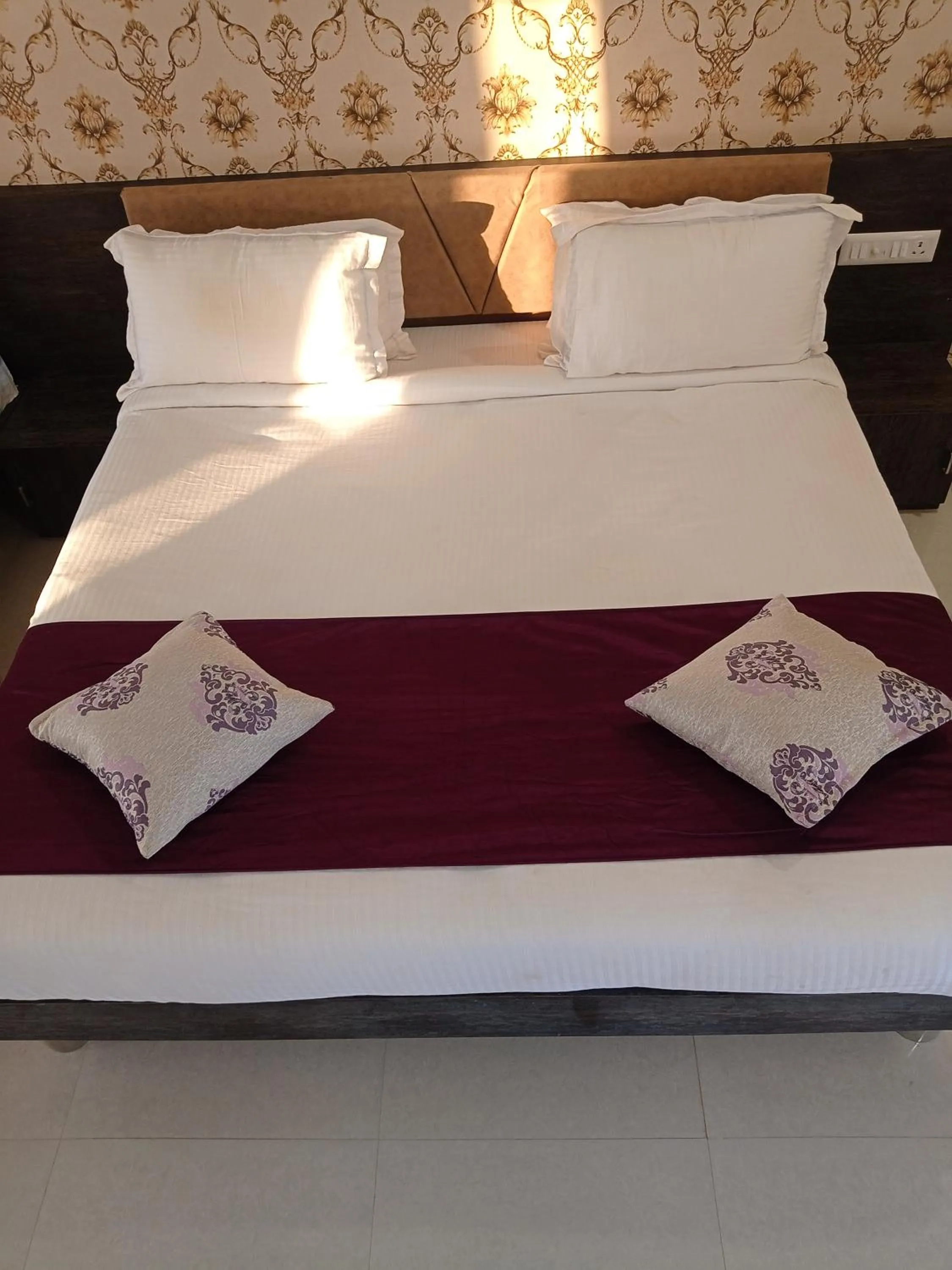 Bed in Vijayam Resort