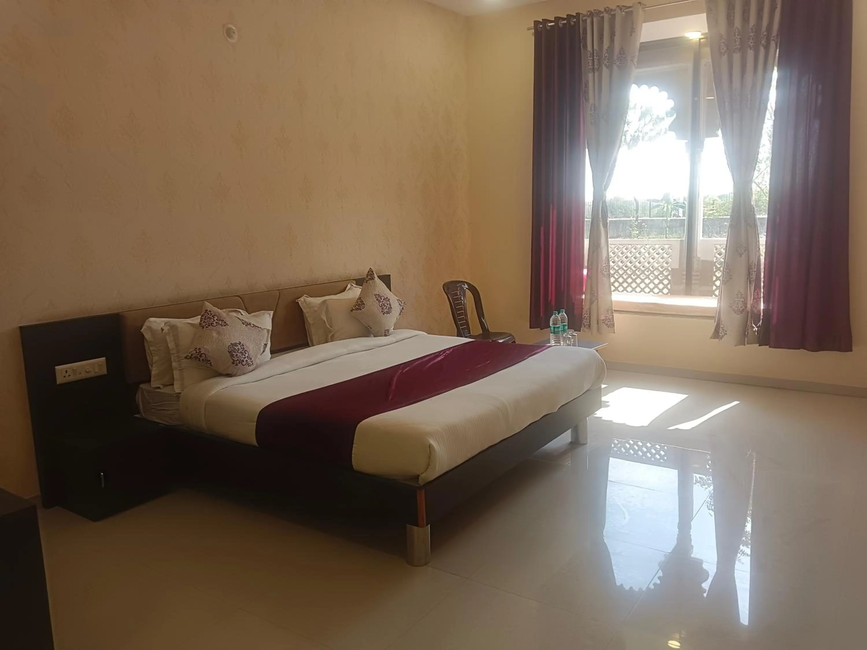 Bed in Vijayam Resort